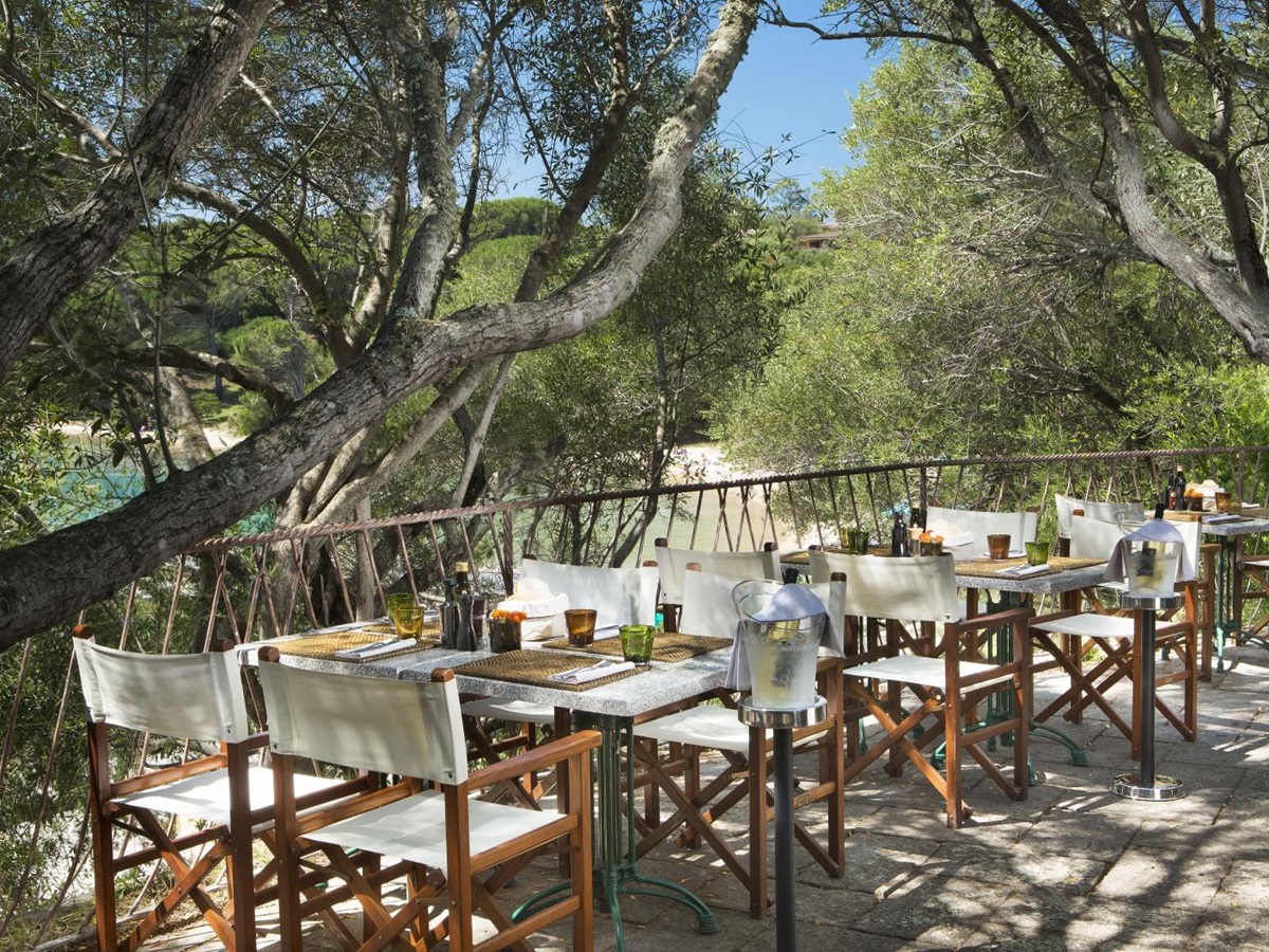 Casual dining overlooking the bay at luxury hotel Capo d'Orso on Sardinia, Italy