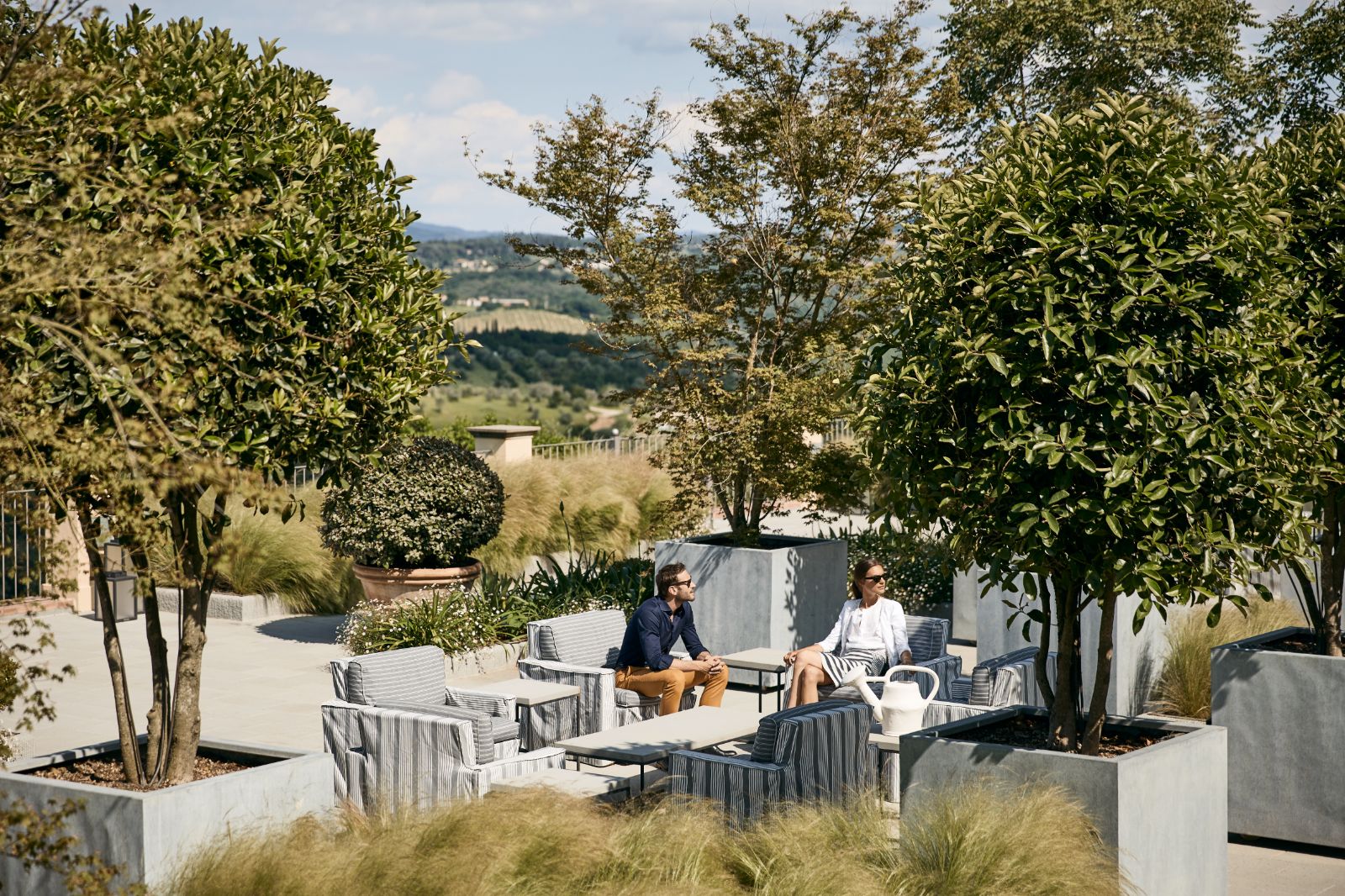 Luxury Hotel COMO Castello del Nero Terrace Outdoor Seating Area 