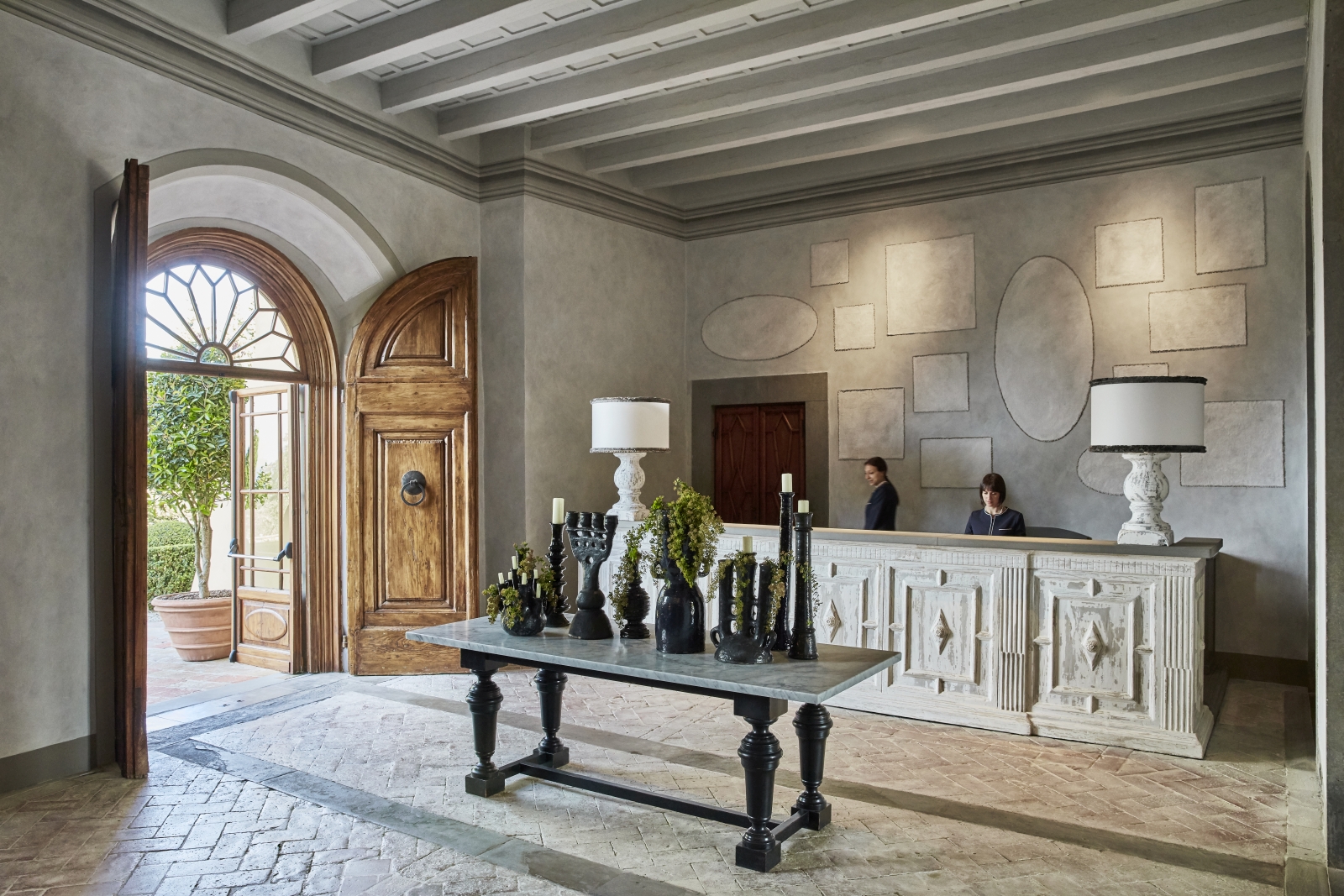Reception with art at luxury resort COMO Castello del Nero in Italy