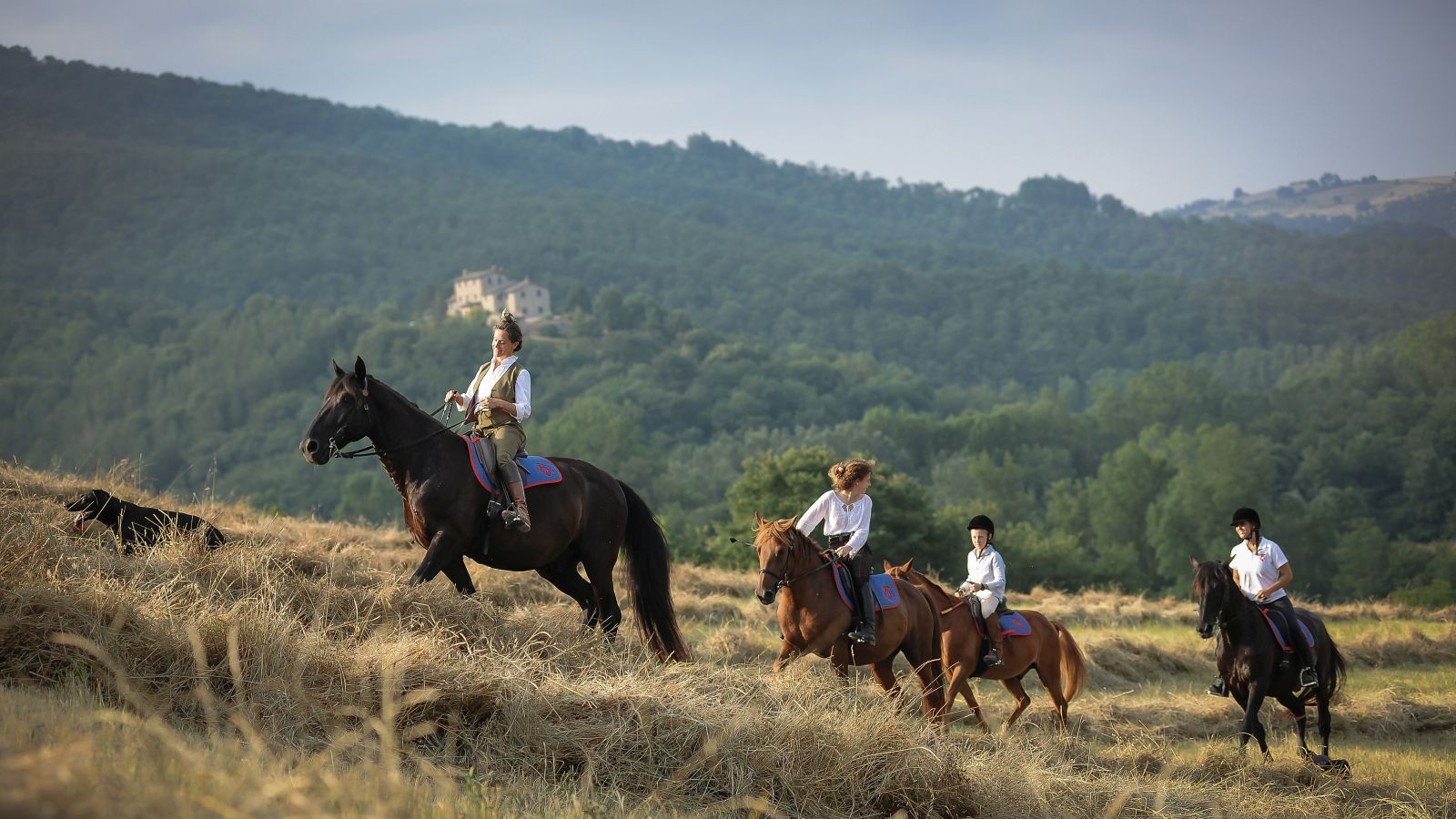 Guests riding in the Castello di Reschio estate in Umbria Italy