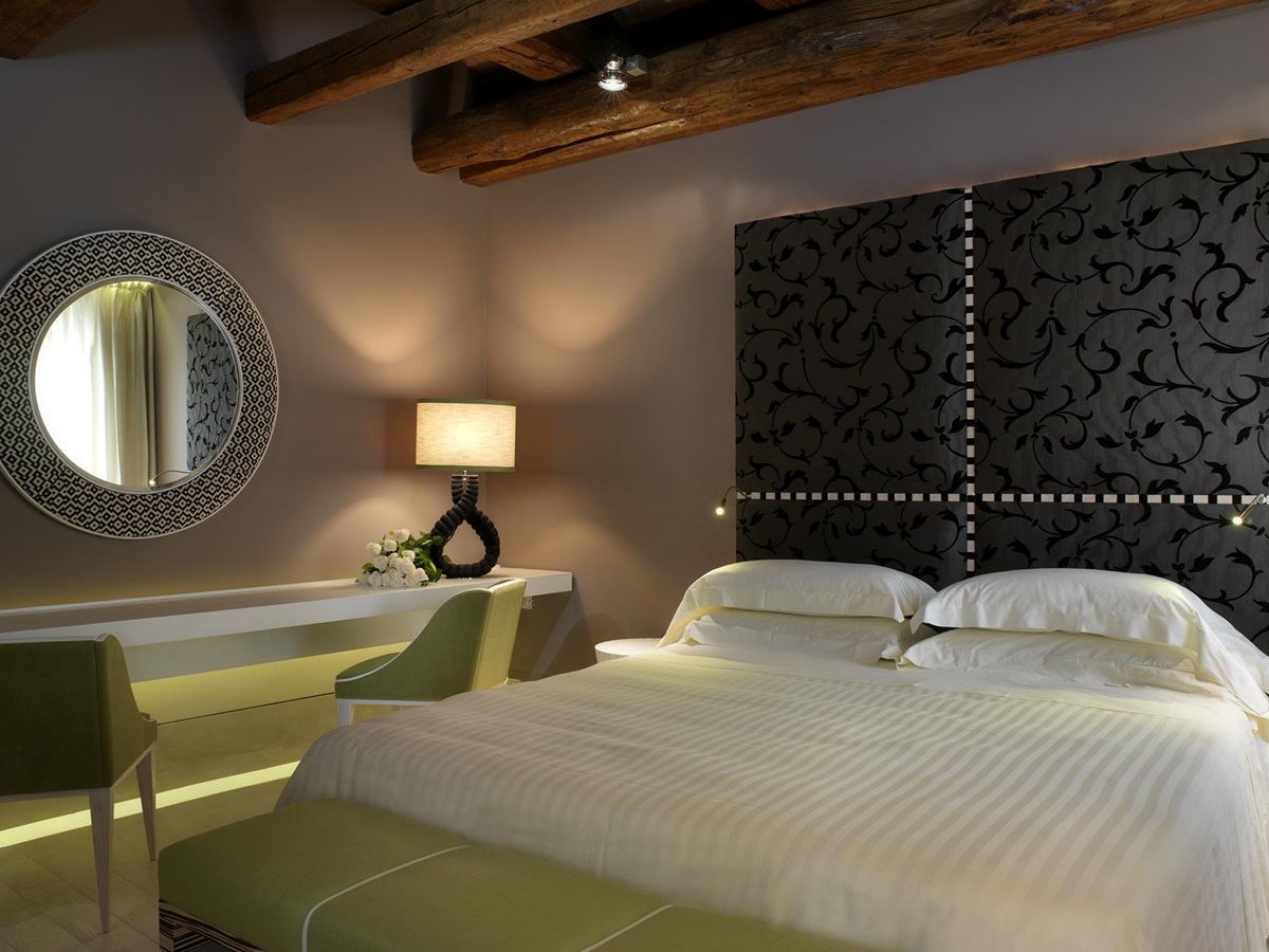 Green double bedroom of Centurion Palace, Italy