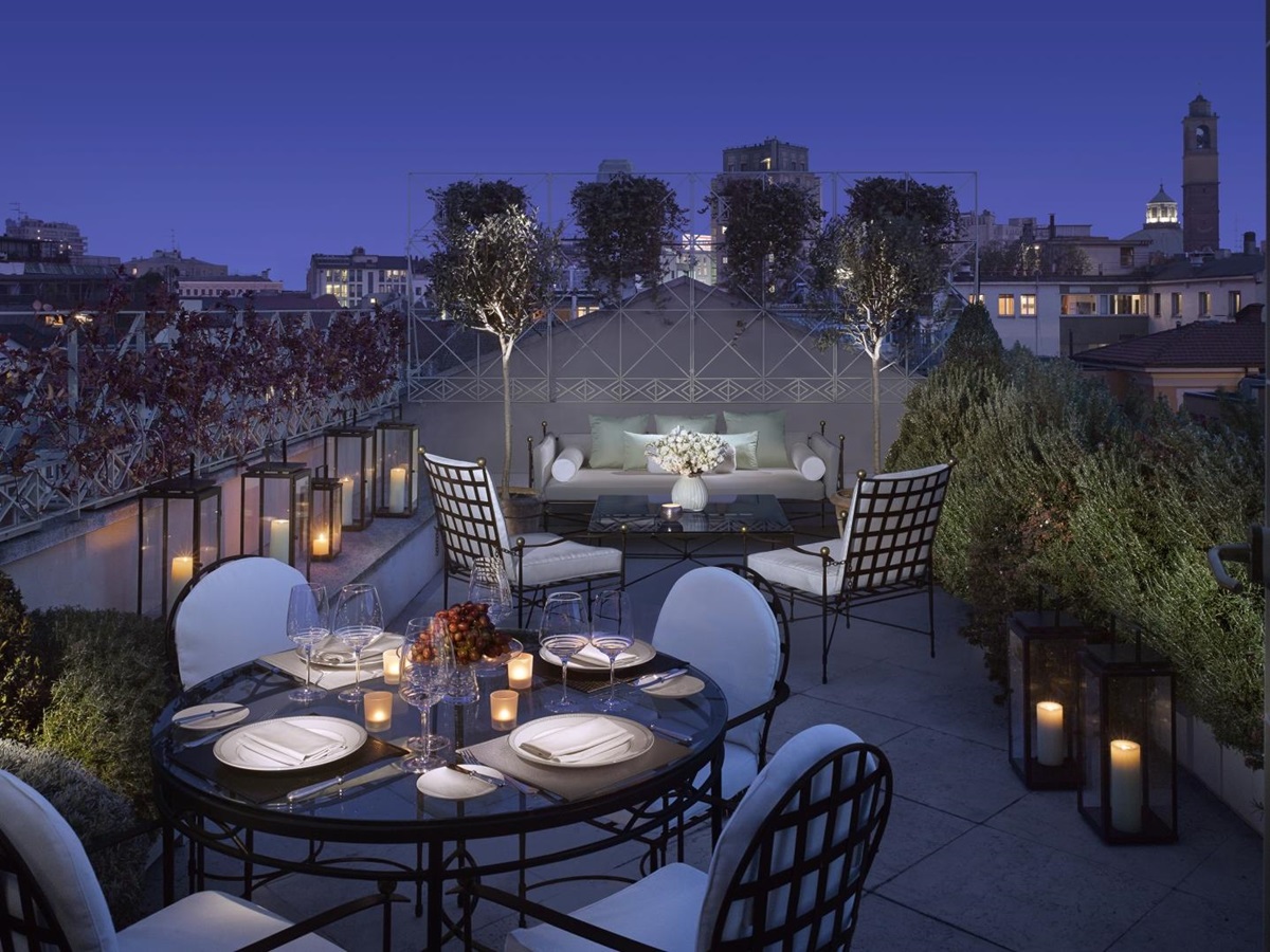 the balcony of the Penthouse Suite set up for a private dinner