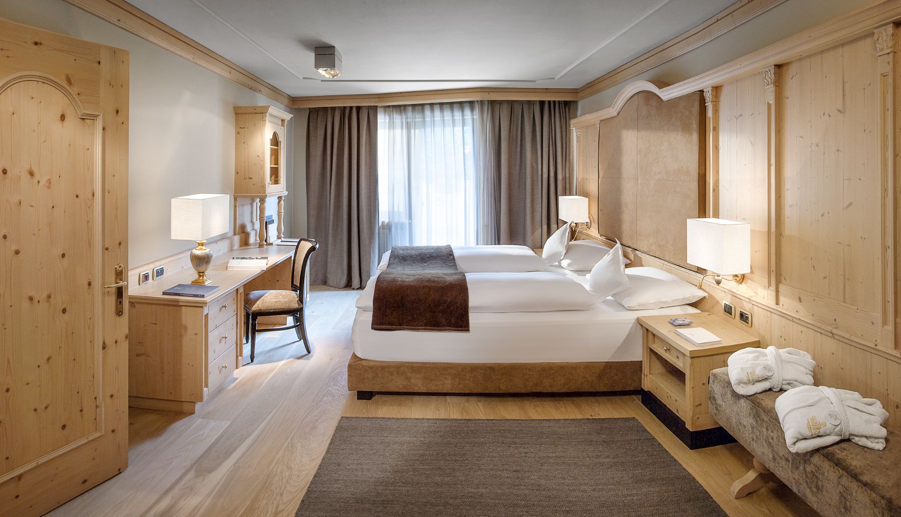 Deluxe suite at Gardena Grodnerhof Hotel & Spa in the Dolomites