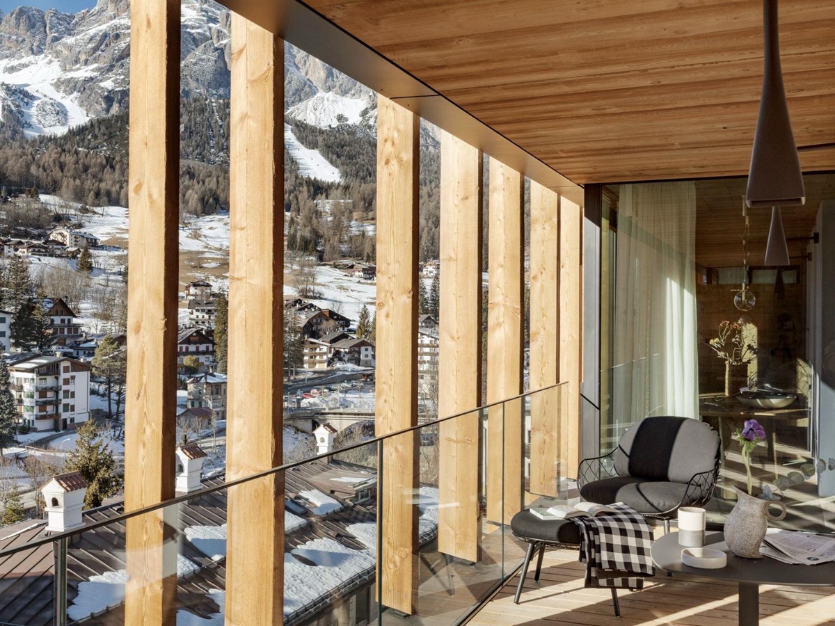 Terrace with mountain views at Hotel de Len in the Dolomites