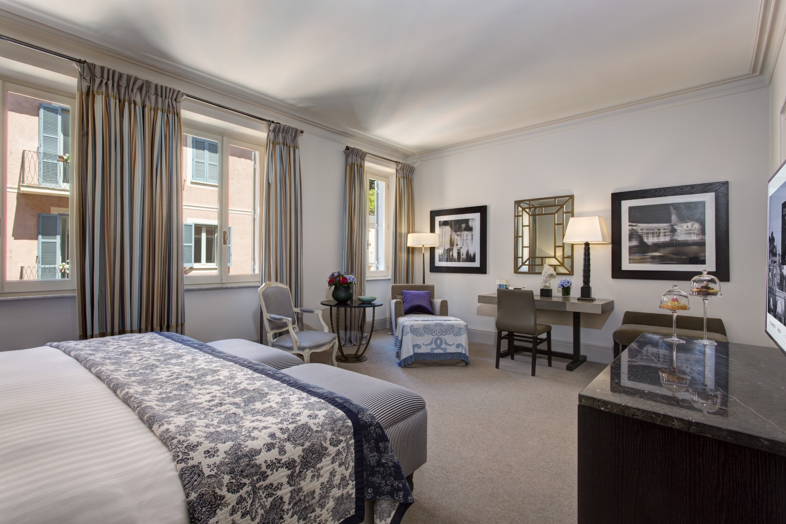 Spacious Deluxe Room with big windows at Hotel de Russie, luxury hotel in Rome, Italy