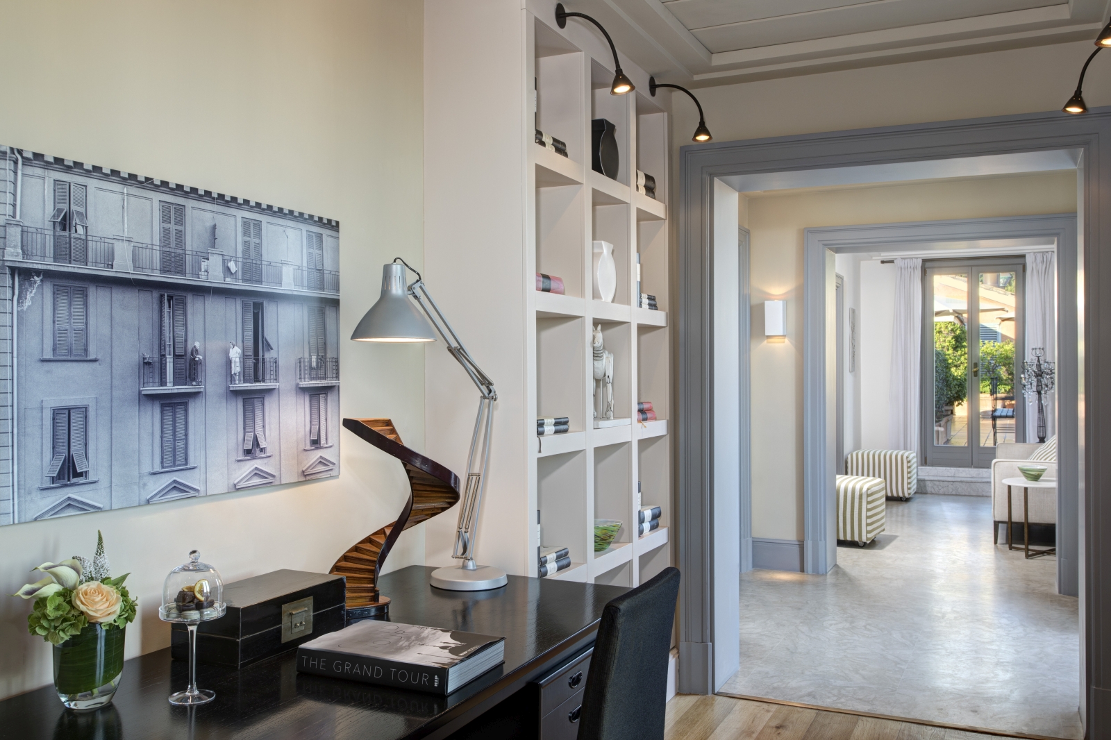 Library in the Nijinsky Suite with desk and art at Hotel de Russie, luxury hotel in Rome, Italy