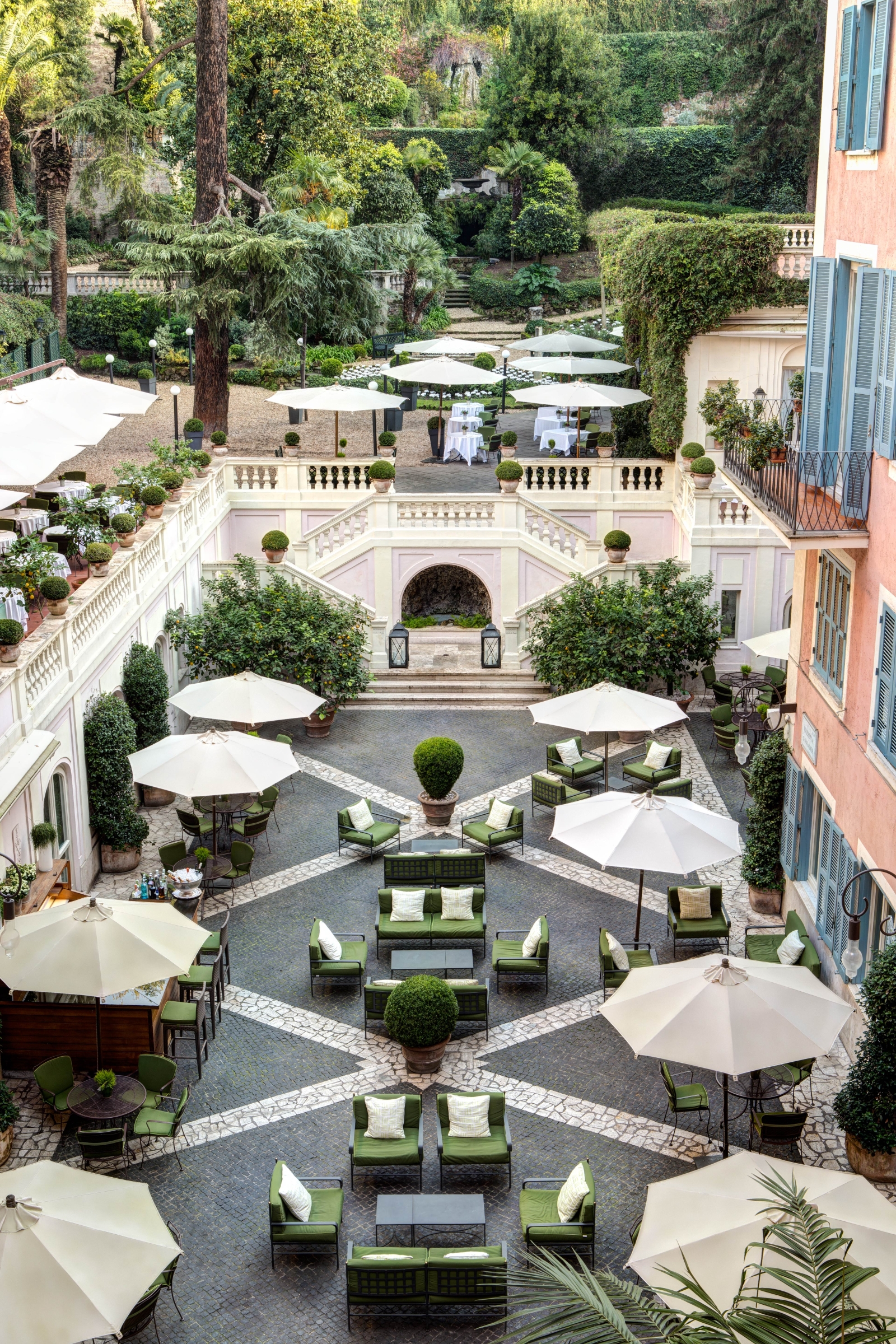 View over the Piazetta and Secret Garden bars and restaurants at Hotel de Russie, luxury hotel in Rome, Italy