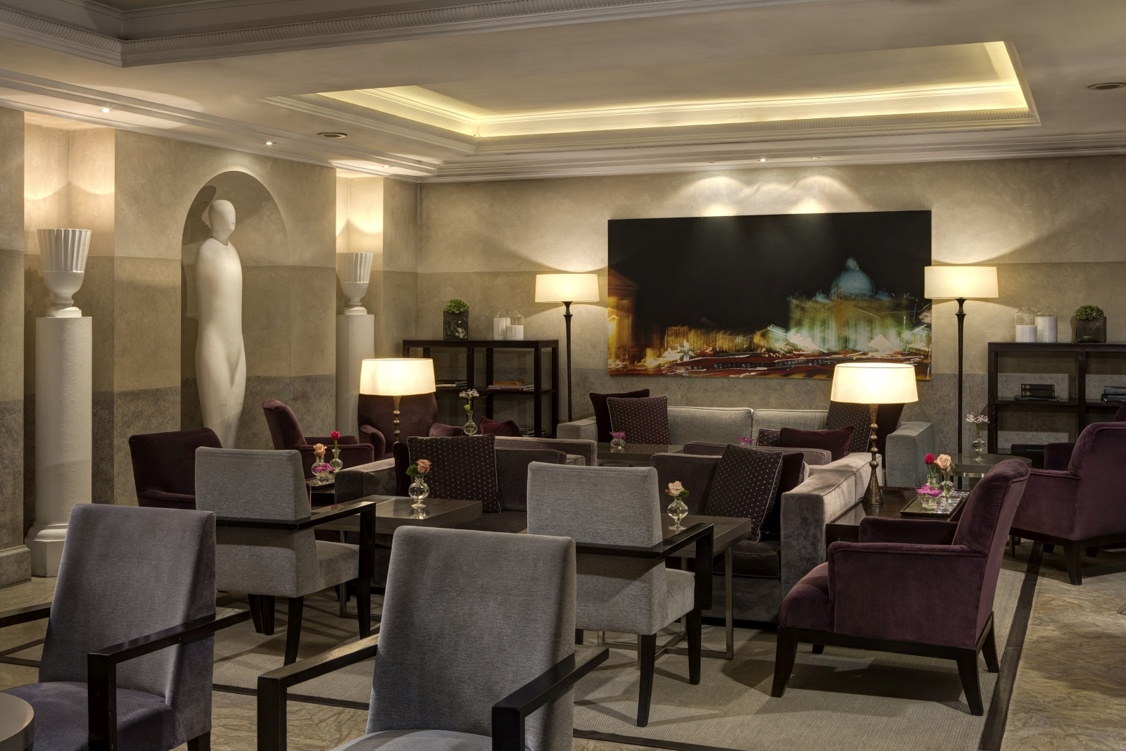 Sitting area of the Stravinskij Bar with minimalistic design and artwork at Hotel de Russie, luxury hotel in Rome, Italy