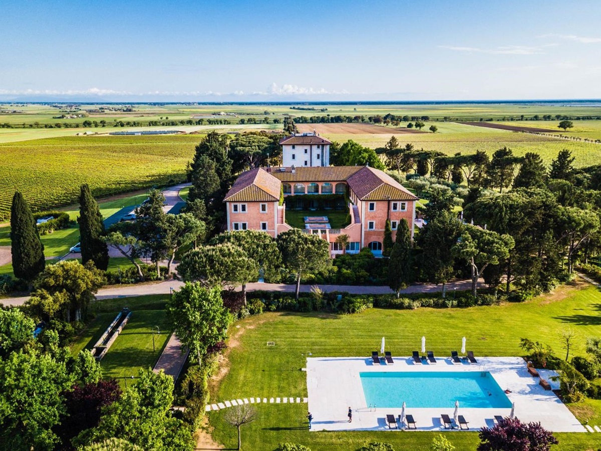 Aerial view of Hotel L'Andana Tuscany and surrounding countryside
