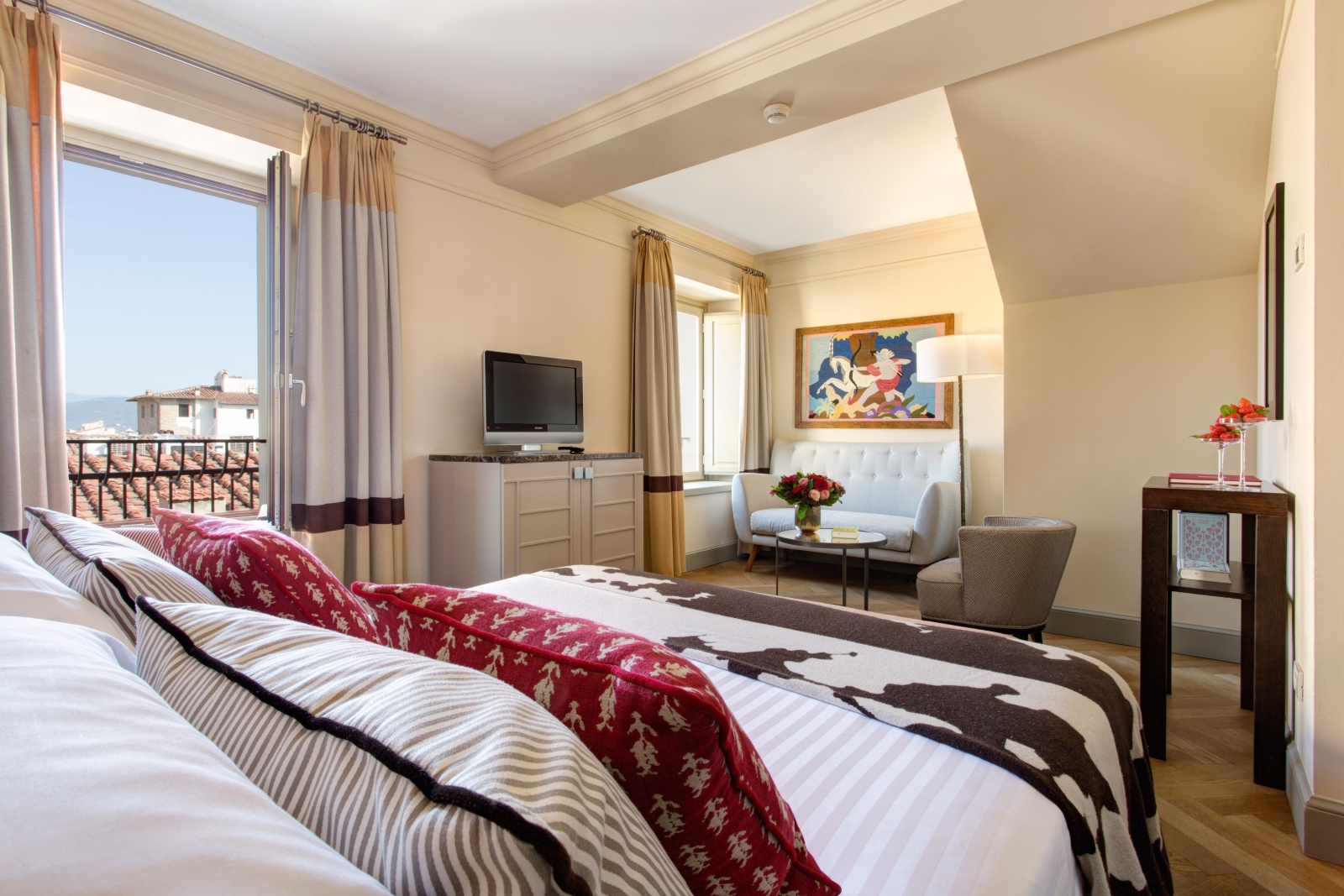 A spacious Deluxe Double Room at Hotel Savoy, a luxury hotel in Florence, Italy