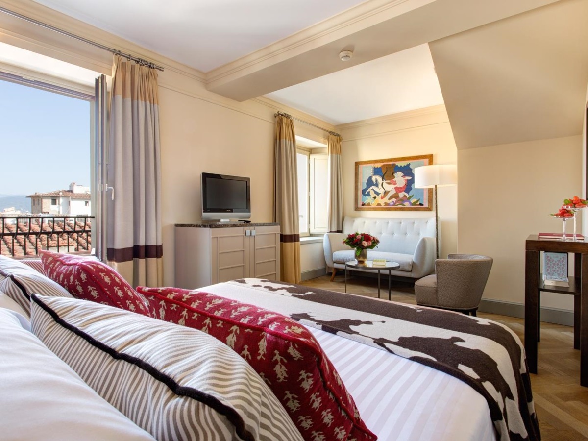 A spacious Deluxe Double Room at Hotel Savoy, a luxury hotel in Florence, Italy