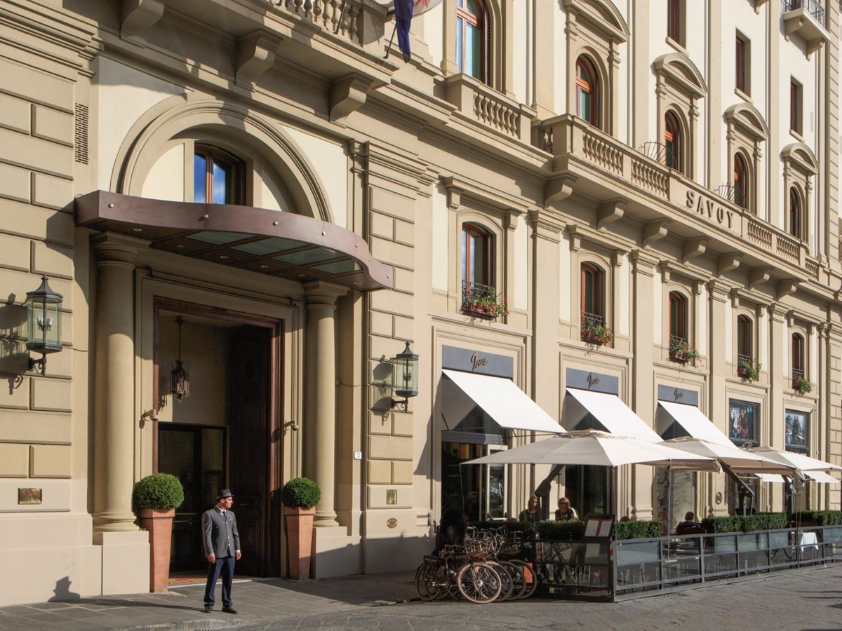 Exterior of Hotel Savoy with tables of Irene restaurant outside