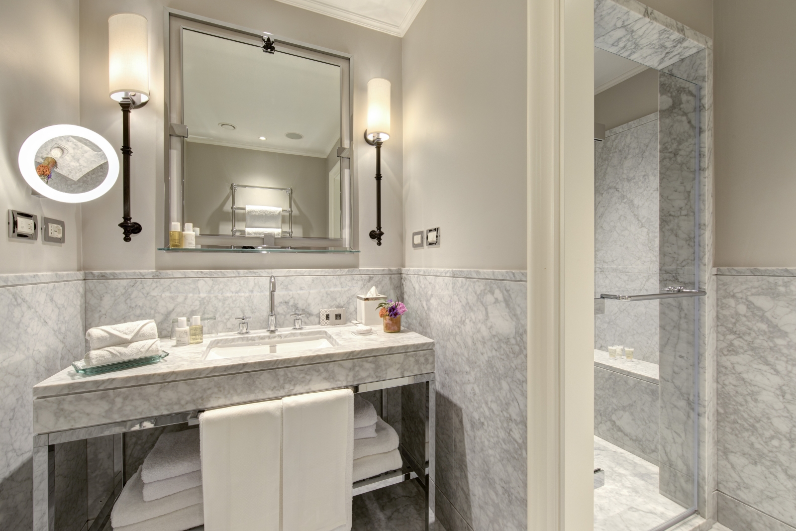 Marble bathroom of a Junior Suite at Hotel Savoy, a luxury hotel in Florence, Italy