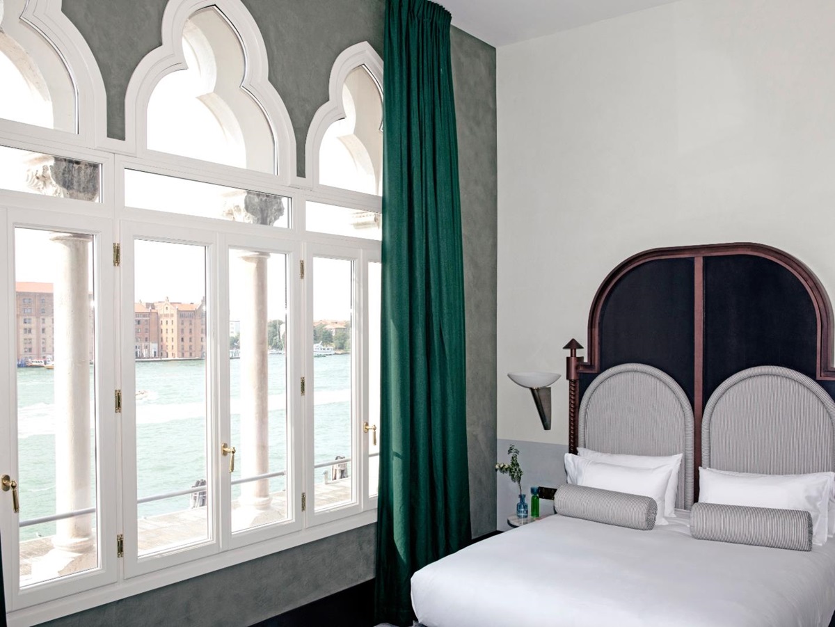 Guest room with views of the canal at Il Palazzo Experimental in Venice