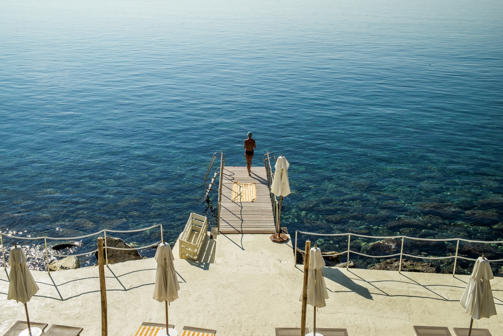 Jetty leading to sea at Il Pellicano