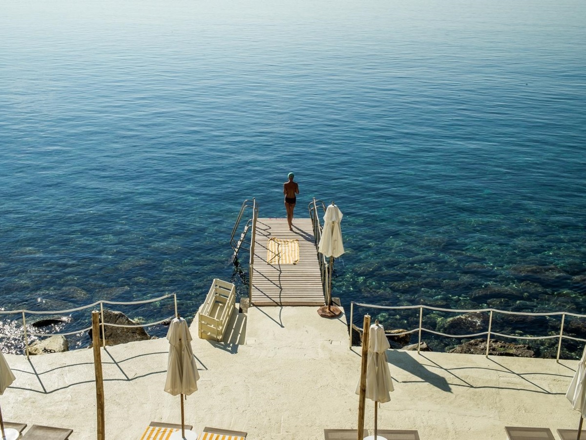 Jetty leading to sea at Il Pellicano