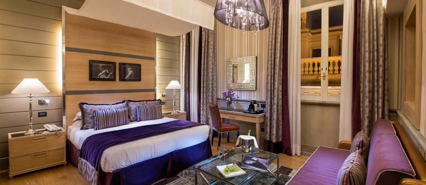 Purple styled room at Inn at Spanish Steps