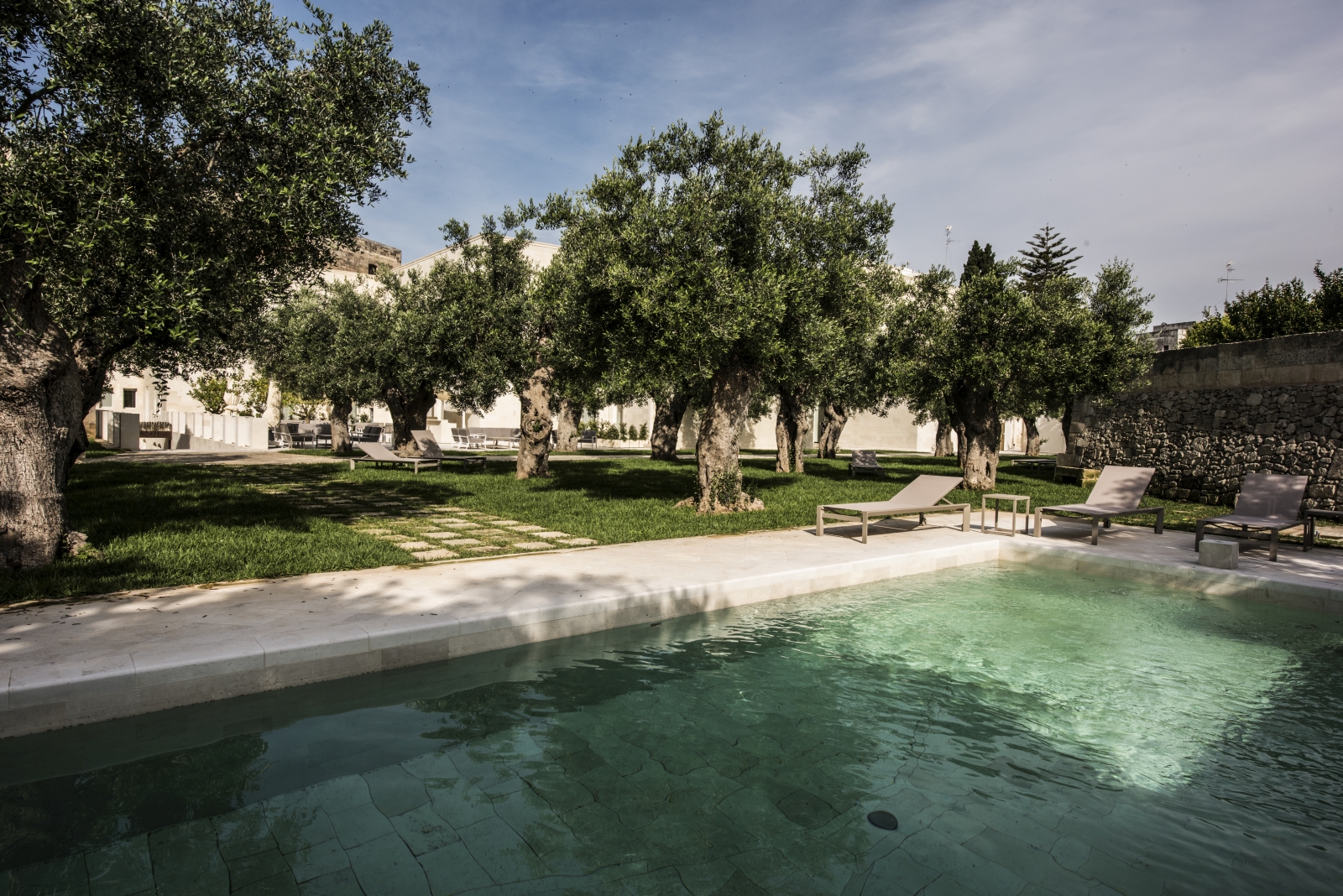 Olive-lined pool at La Fiermontina