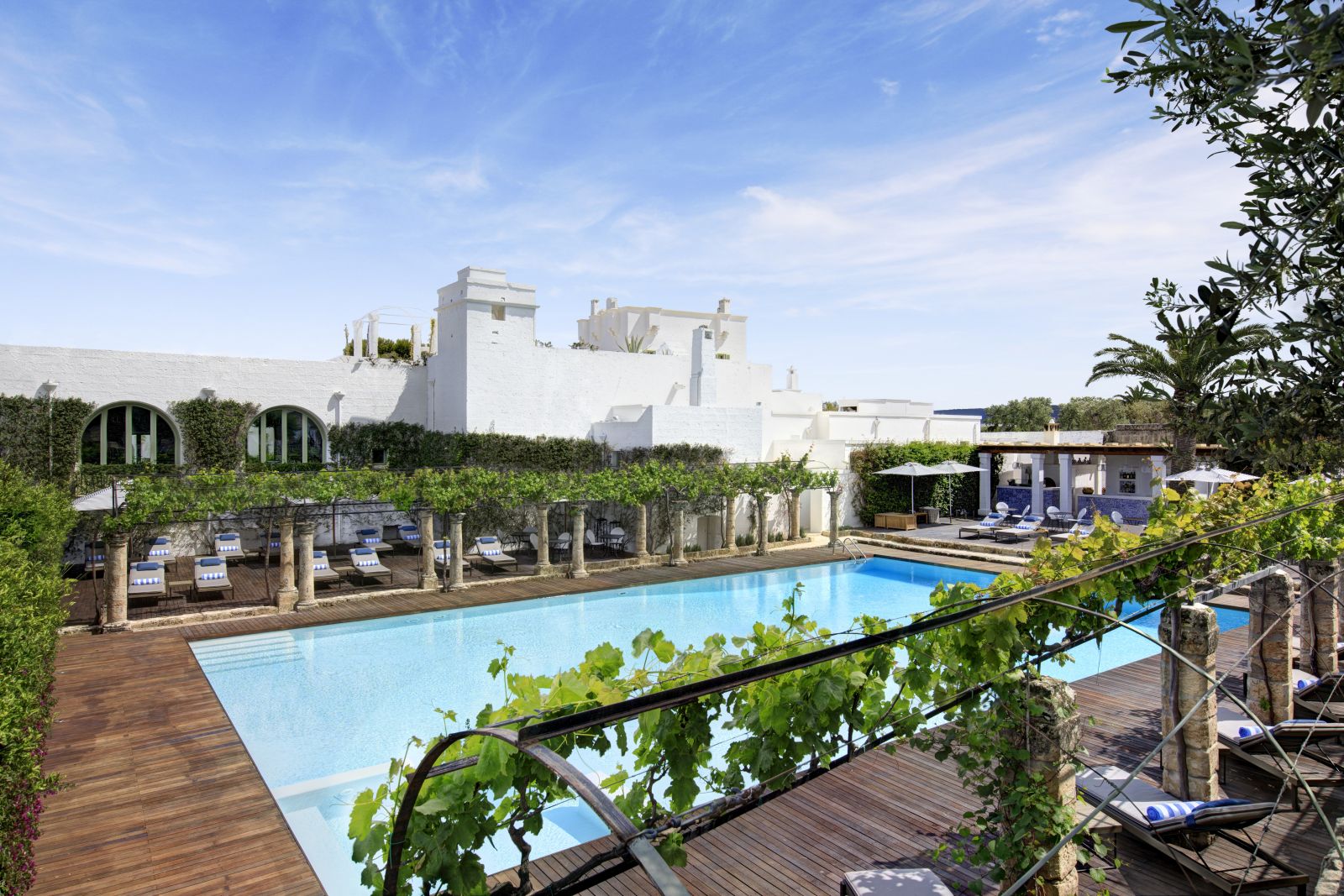 View over the pool and terrace at Masseria Torre Maizza in Puglia