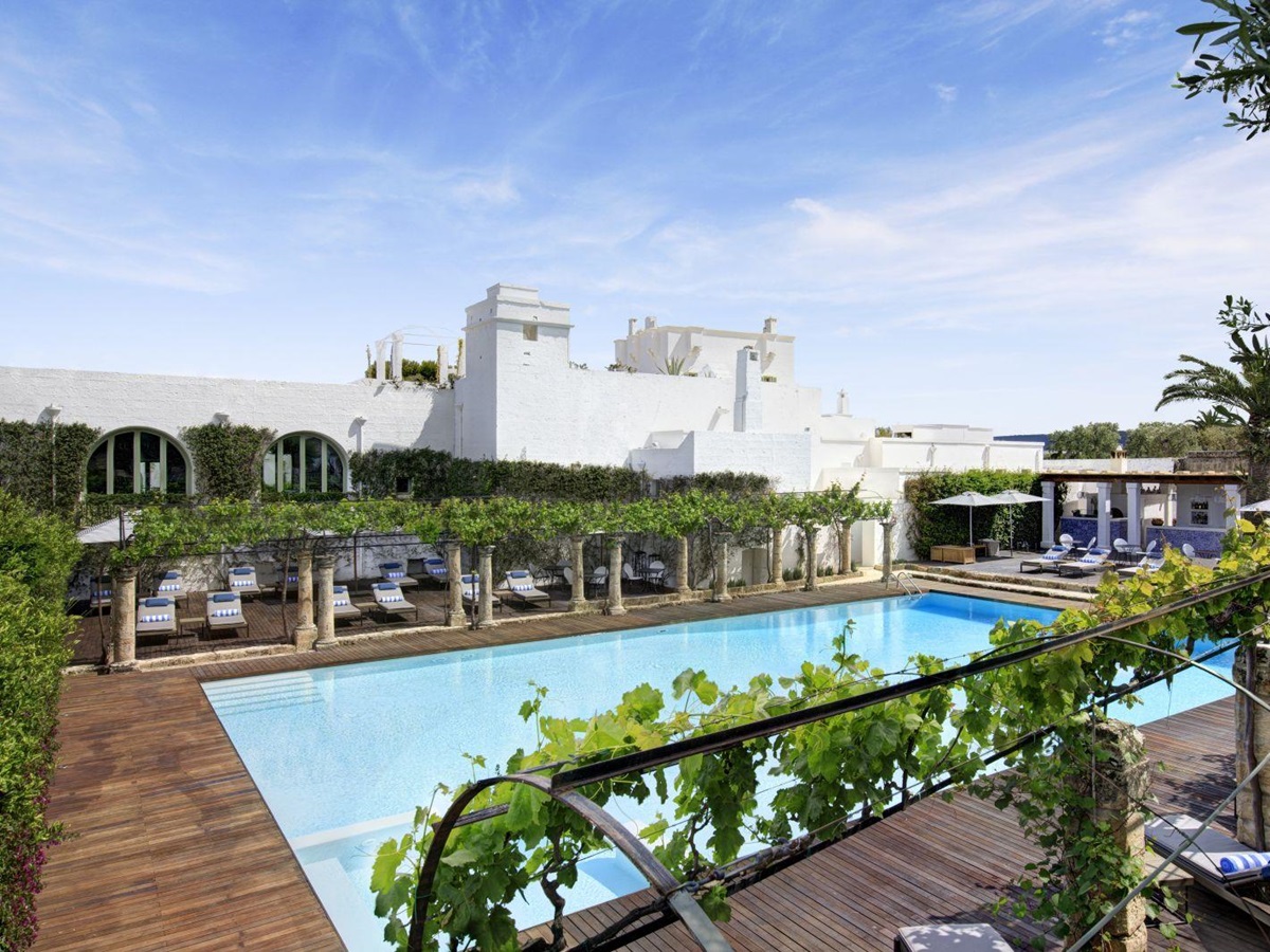 View over the pool and terrace at Masseria Torre Maizza in Puglia