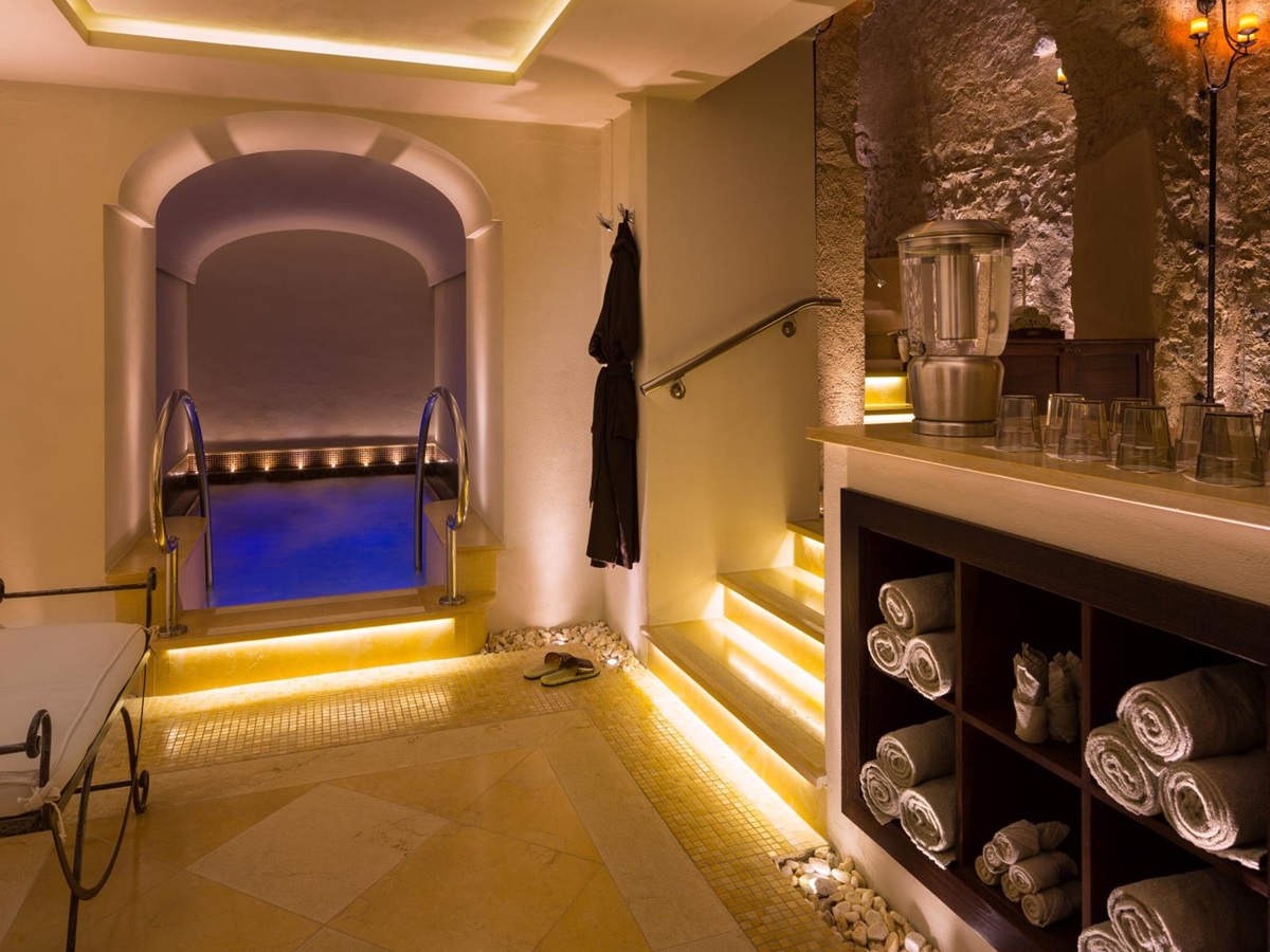 Entrance to the spa and pool at Monastera Santa Rosa, luxury hotel in Italy