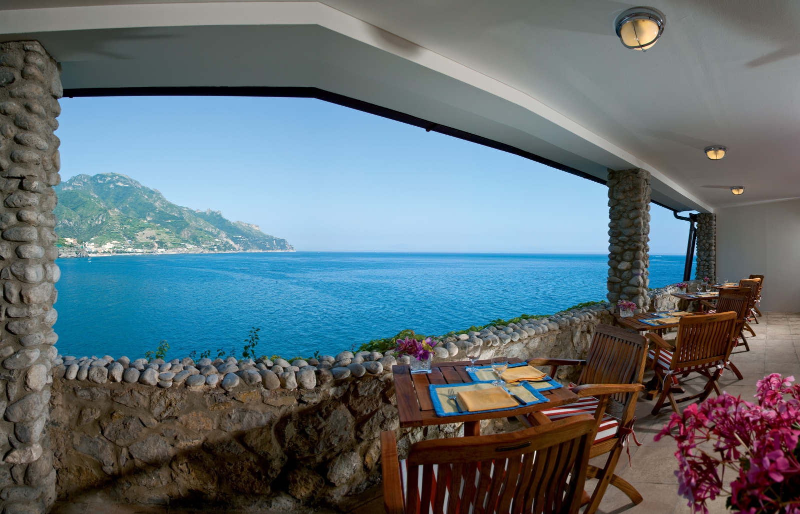 Casual restaurant with sea view at the Clubhouse at Palazzo Avino, luxury hotel in Italy