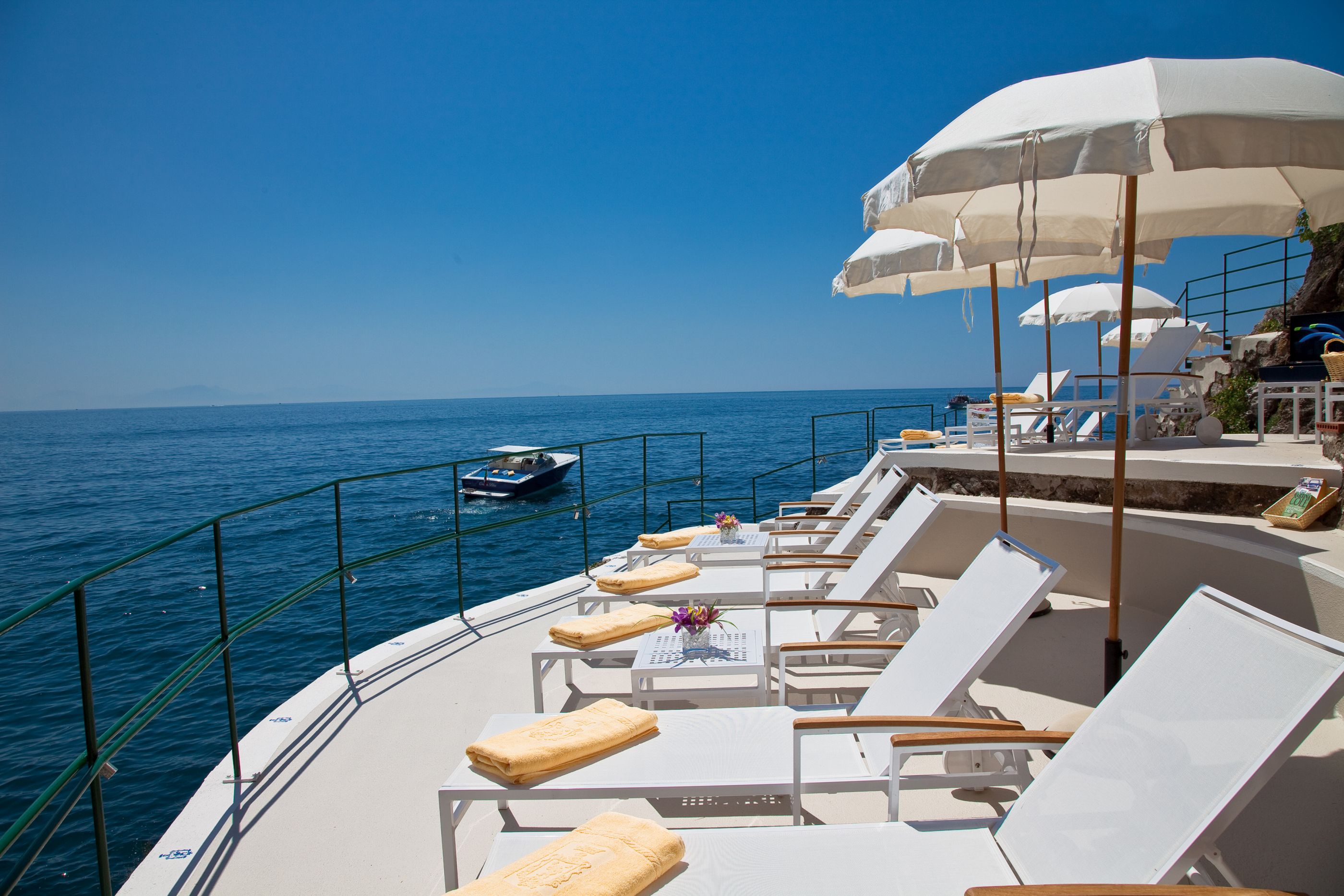 the clubhouse with sunloungers at Palazzo Avino, Italy