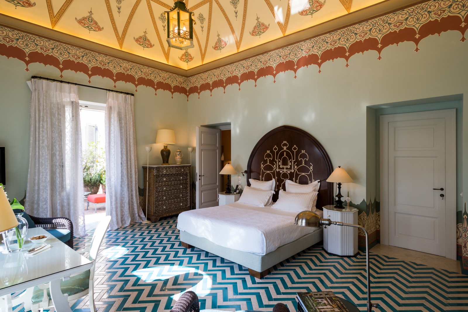 Guest suite with ornate ceiling at Palazzo Margherita