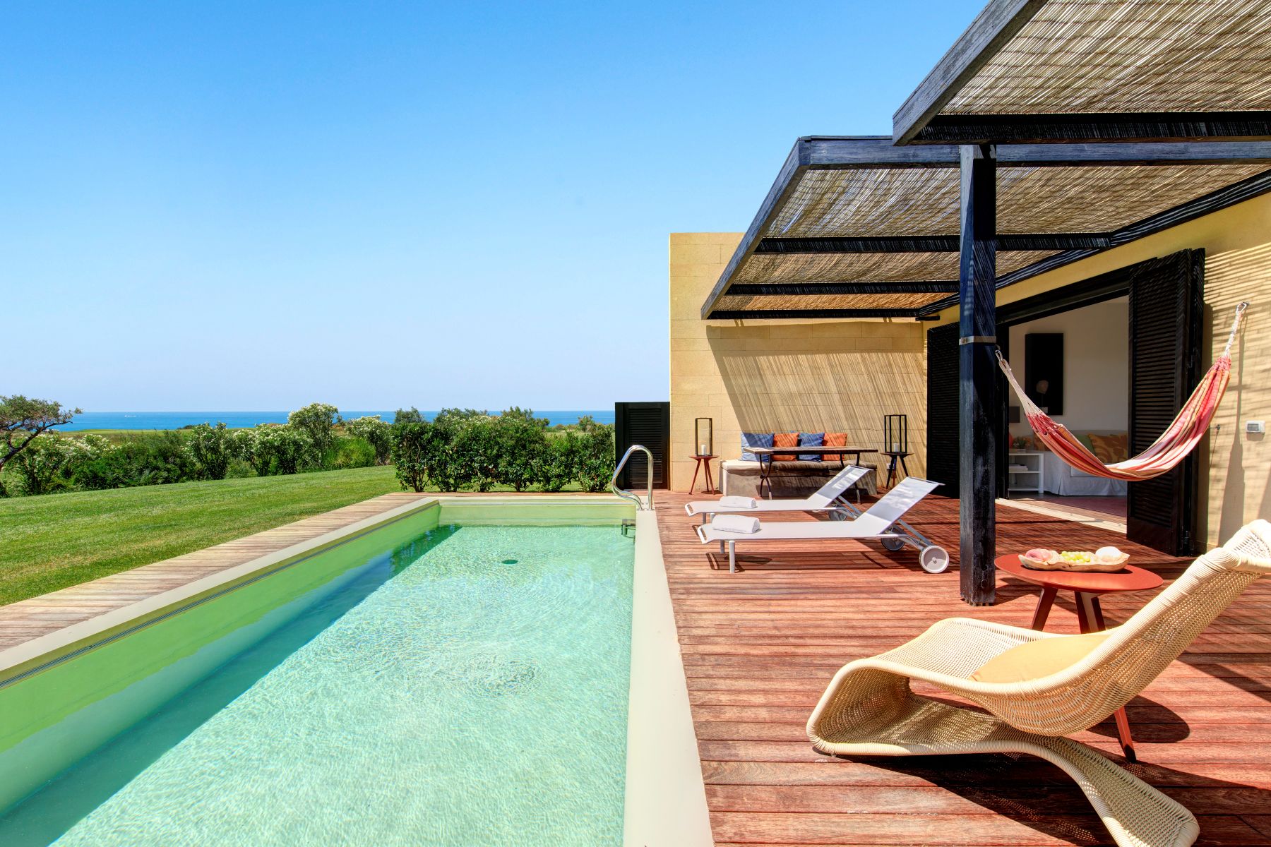 Outdoor pool and terrace of Villa Iris at Rocco Forte Verdura Resort in Sicily