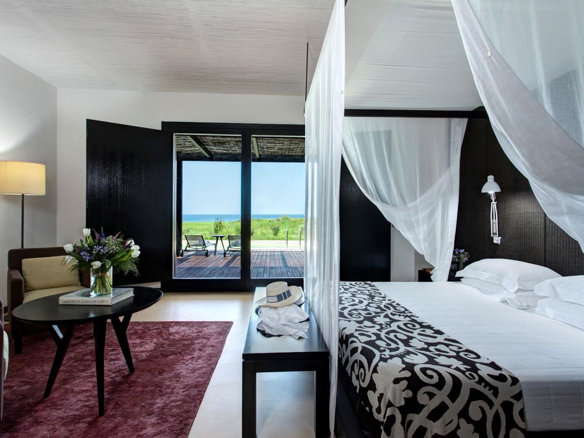 Four poster bed at Villa Peonia at Rocco Forte Verdura Resort in Sicily