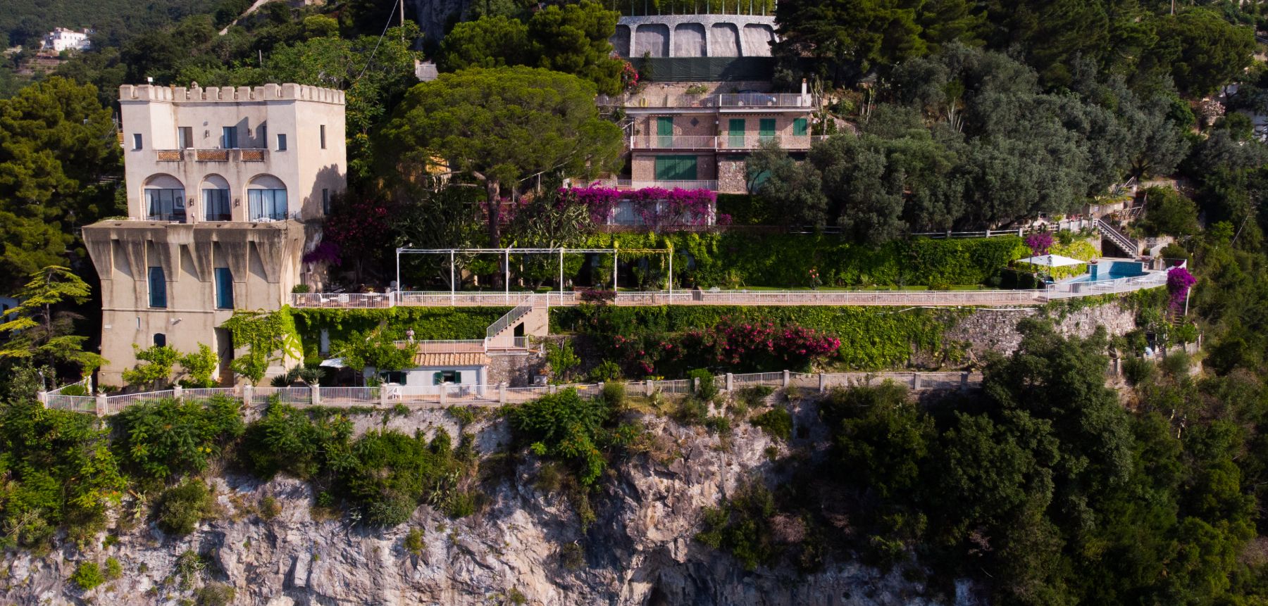 Front view of Castello Sul Mare with view of the terraces and pool area in Amalfi