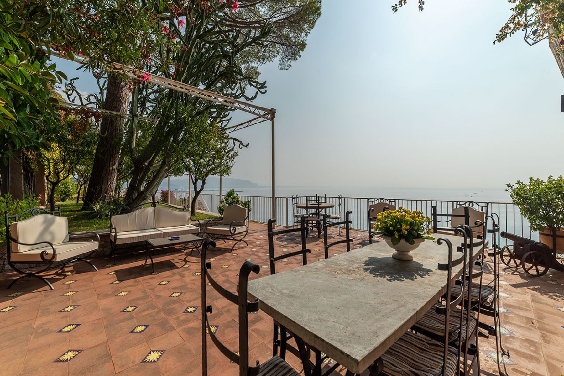 Outdoor dining area on the terrace at Castello Sul Mare in Amalfi