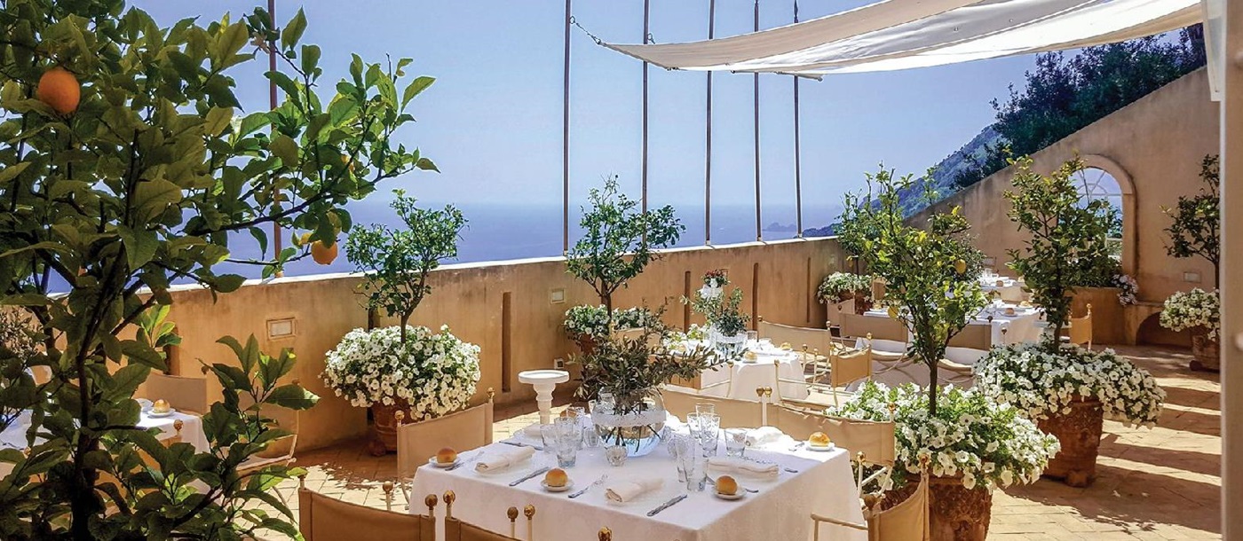 The dining terrace at villa Il Maniero Amalfi Coast Italy