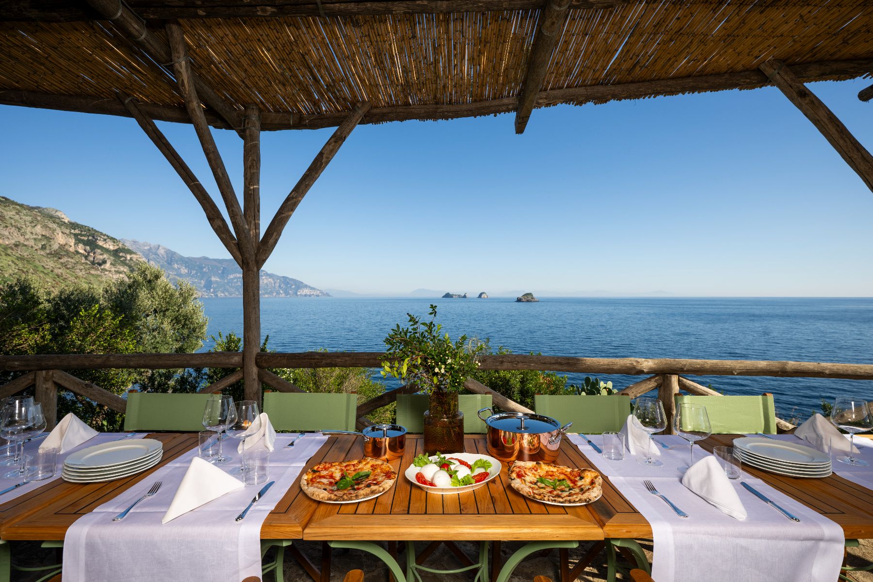 Outdoor dining at Isca Private Island in Amalfi, Italy