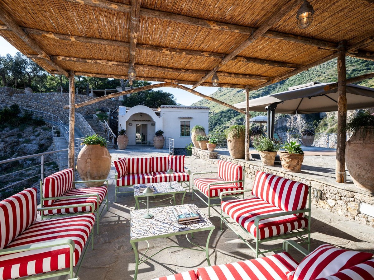 Outdoor seating area at Isca Private Island in Amalfi, Italy