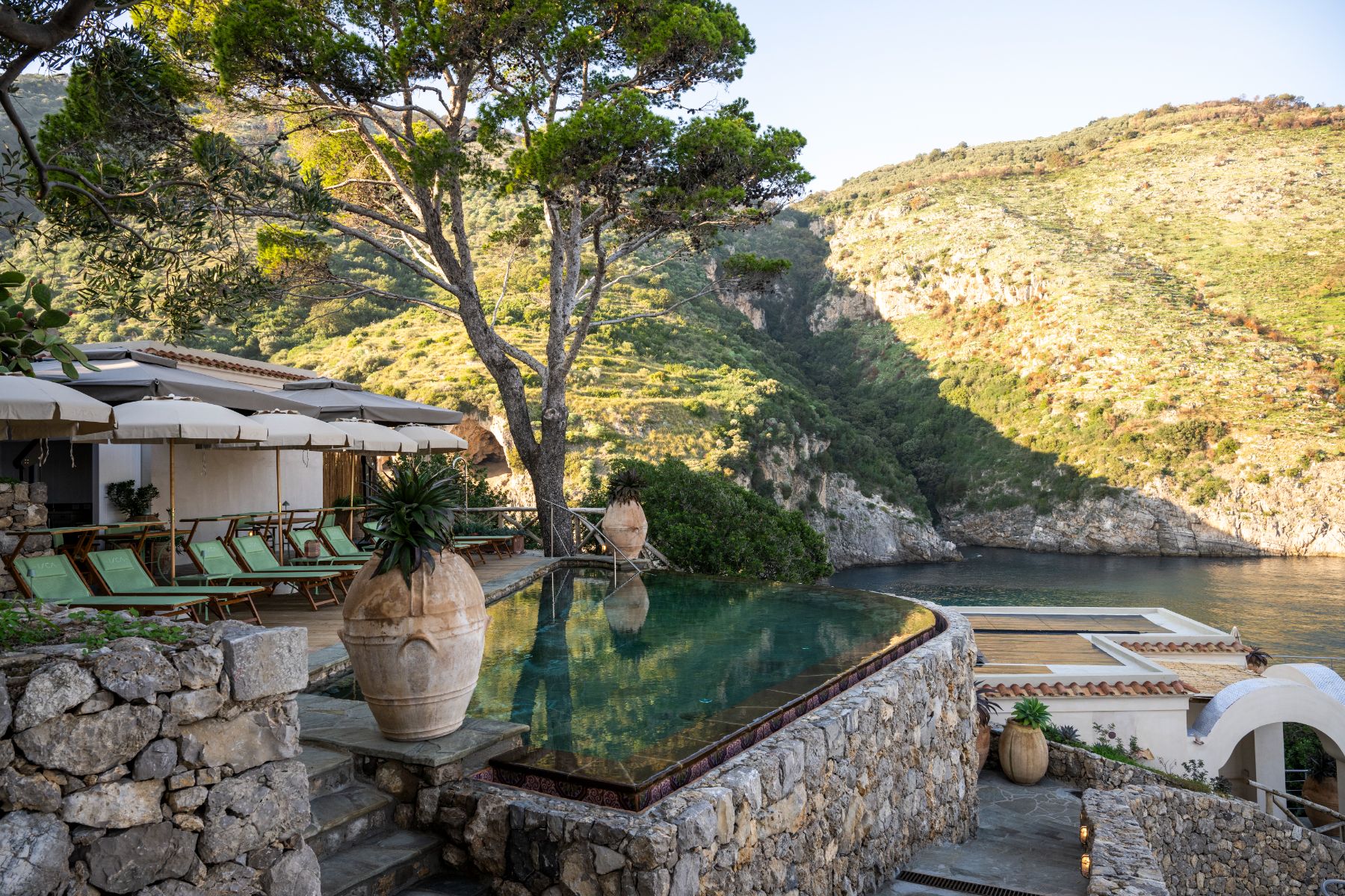 Pool and terrace at Isca Private Island in Amalfi, Italy