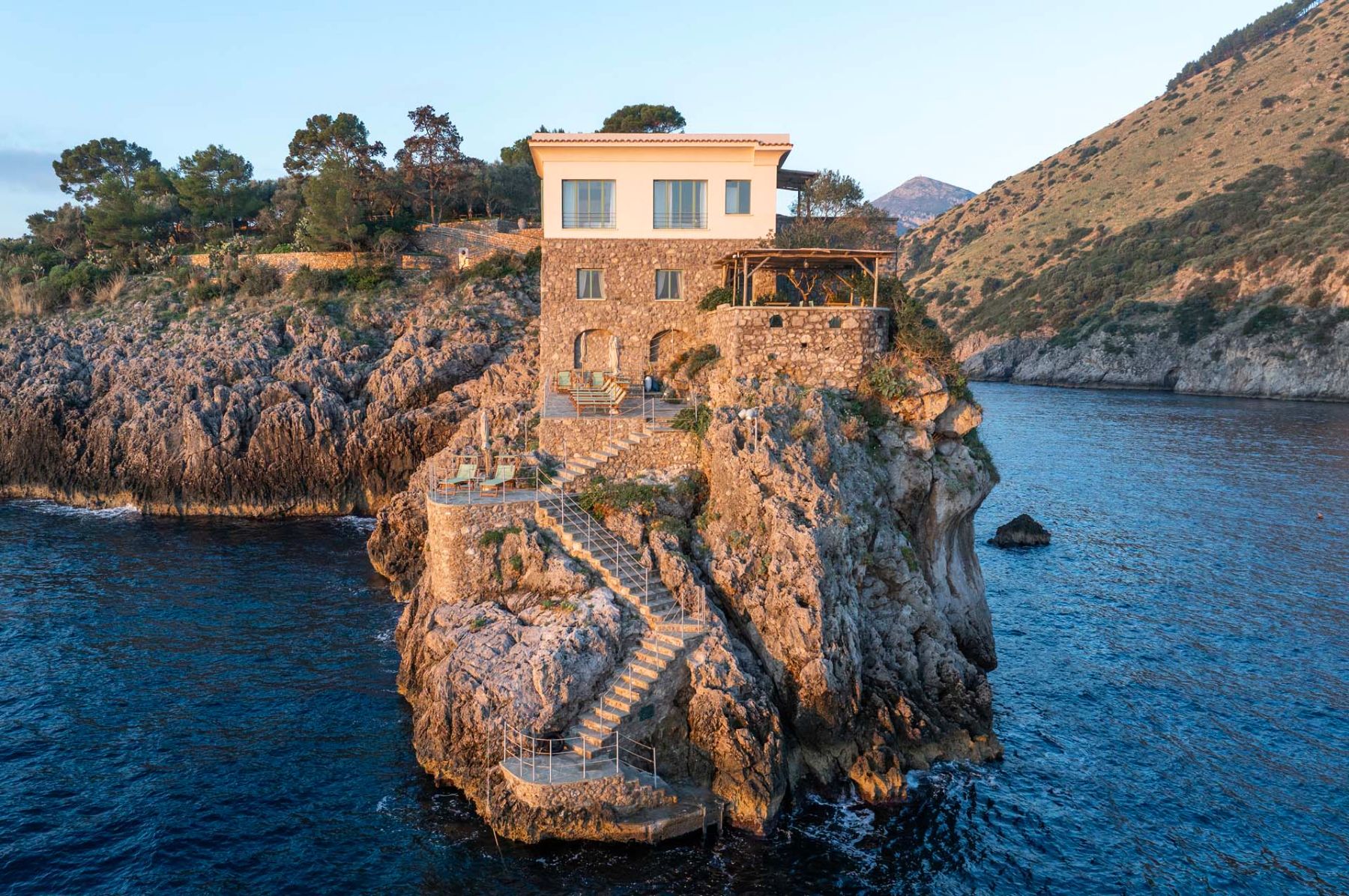Stairs down to the private dock at Isca Private Island in Amalfi, Italy
