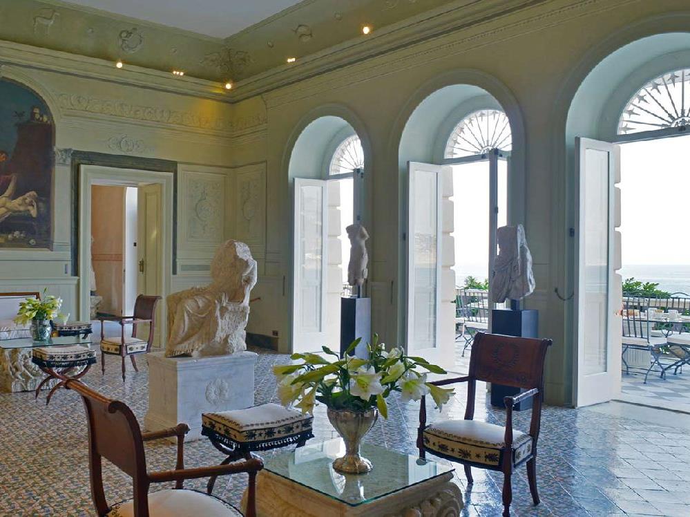 Drawing room and coastal views at Villa Astor Amalfi Italy