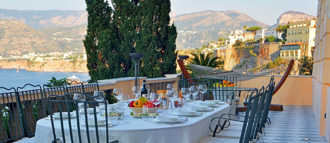Outdoor dining terrace at Villa Astor Amalfi Italy