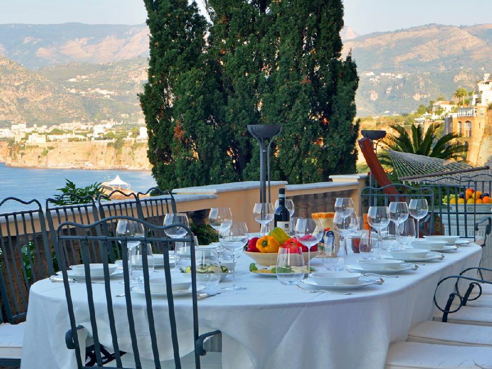 Outdoor dining terrace at Villa Astor Amalfi Italy
