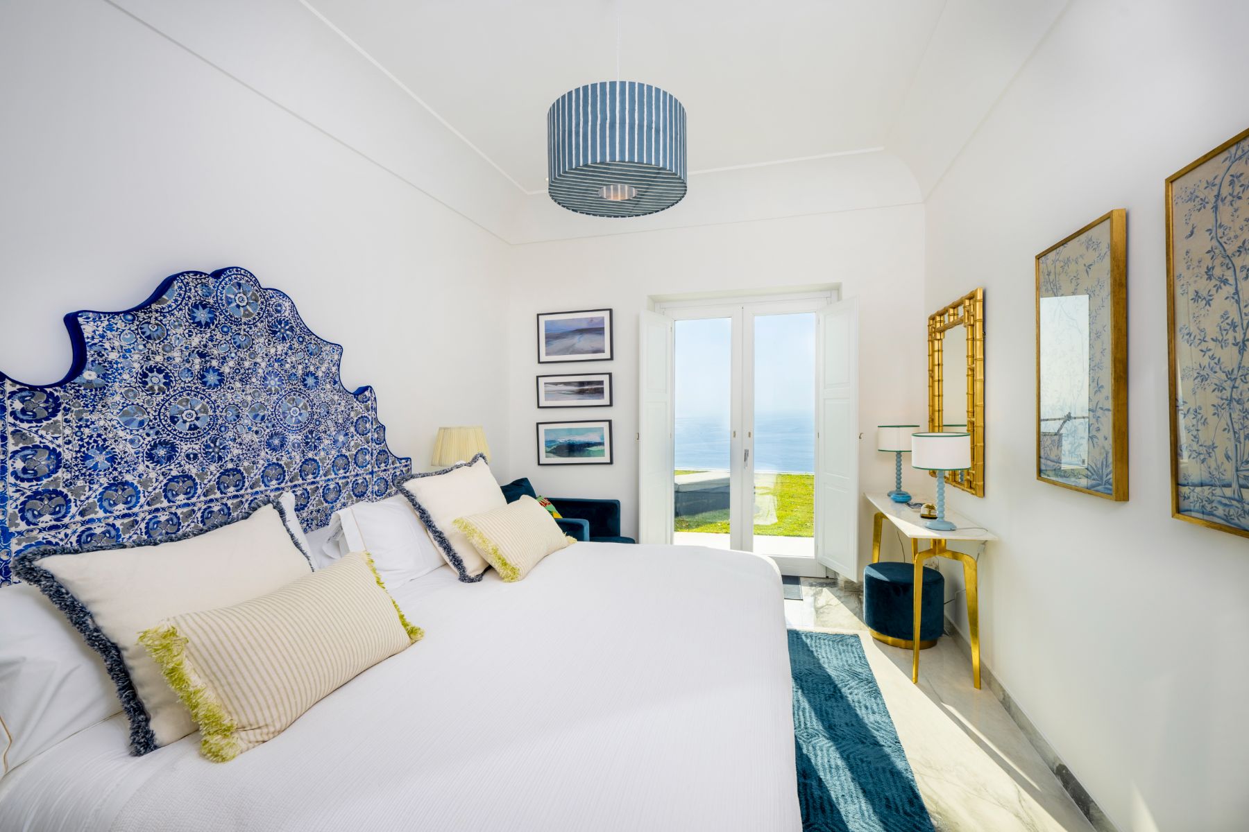 Blue bedroom with sea view at Villa Colorito in Amalfi