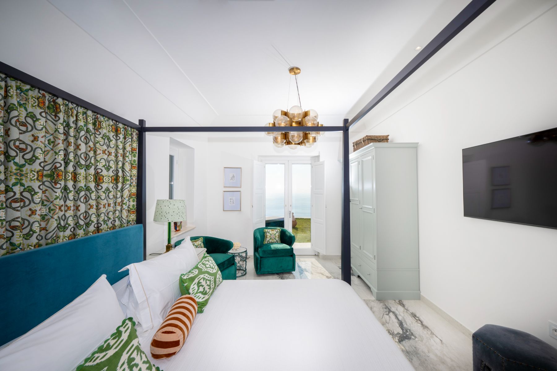 Double four poster bed and sea view at Villa Colorito in Amalfi