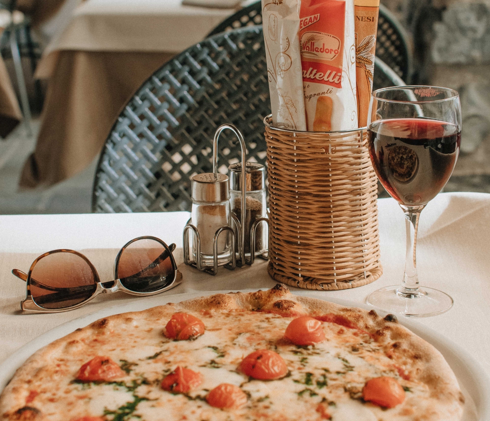 Pizza and wine in pizzeria near to Villa di Praiano on the Amalfi Coast, Italy