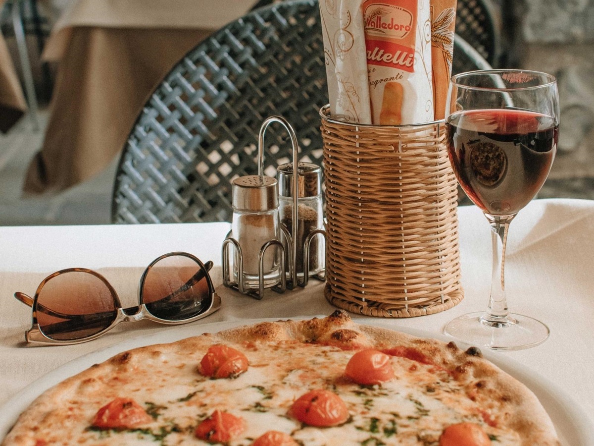 Pizza and wine in pizzeria near to Villa di Praiano on the Amalfi Coast, Italy