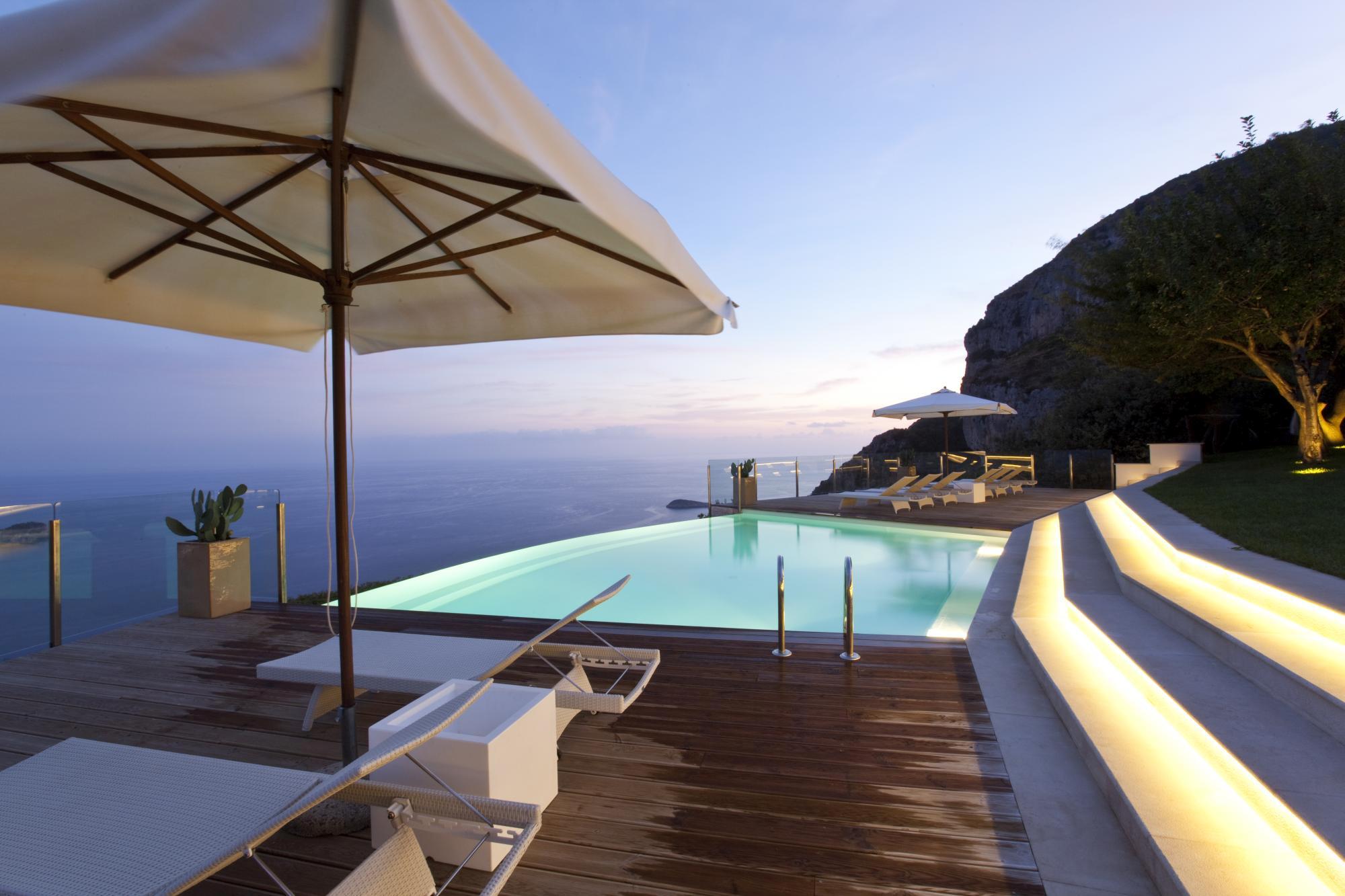 infinity pool at night at ensuite master bedroom in Villa li Galli, Amalfi Coast