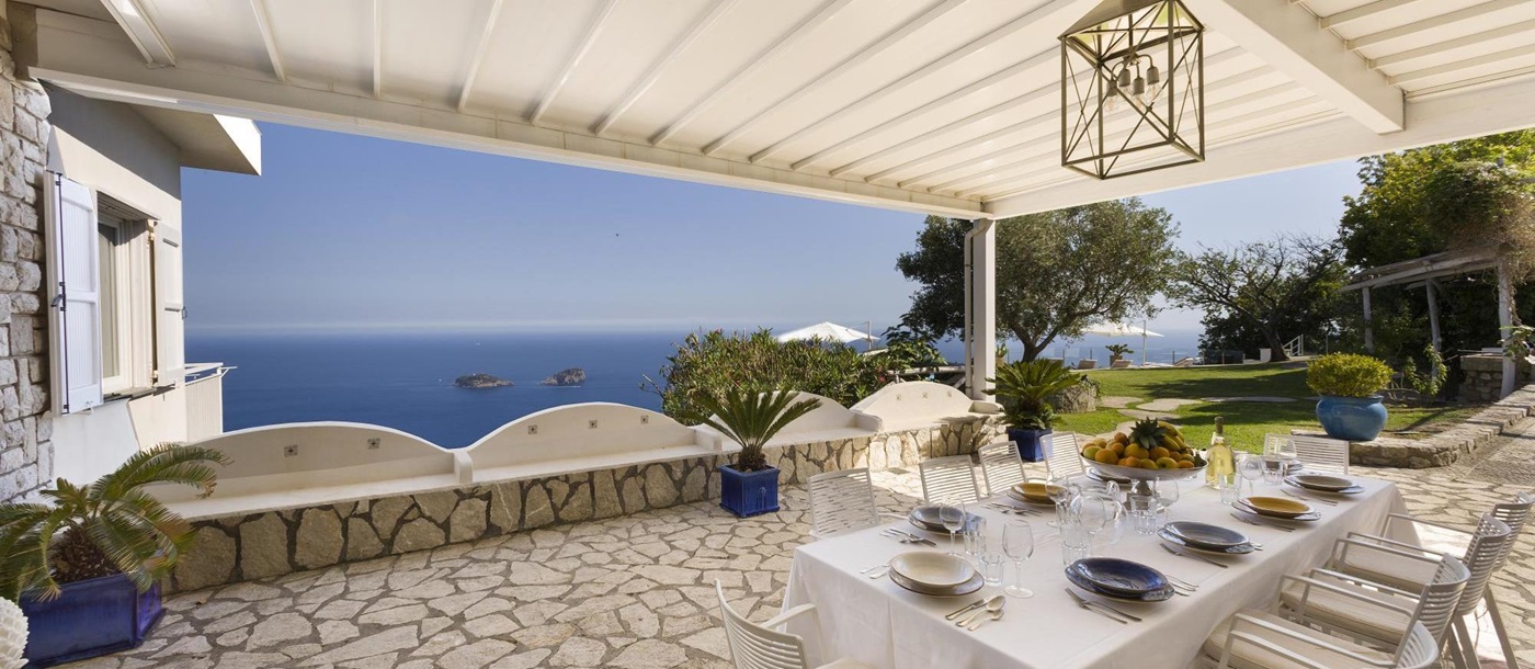 the outdoor terrace with covered roof at ensuite master bedroom in Villa li Galli, Amalfi Coast