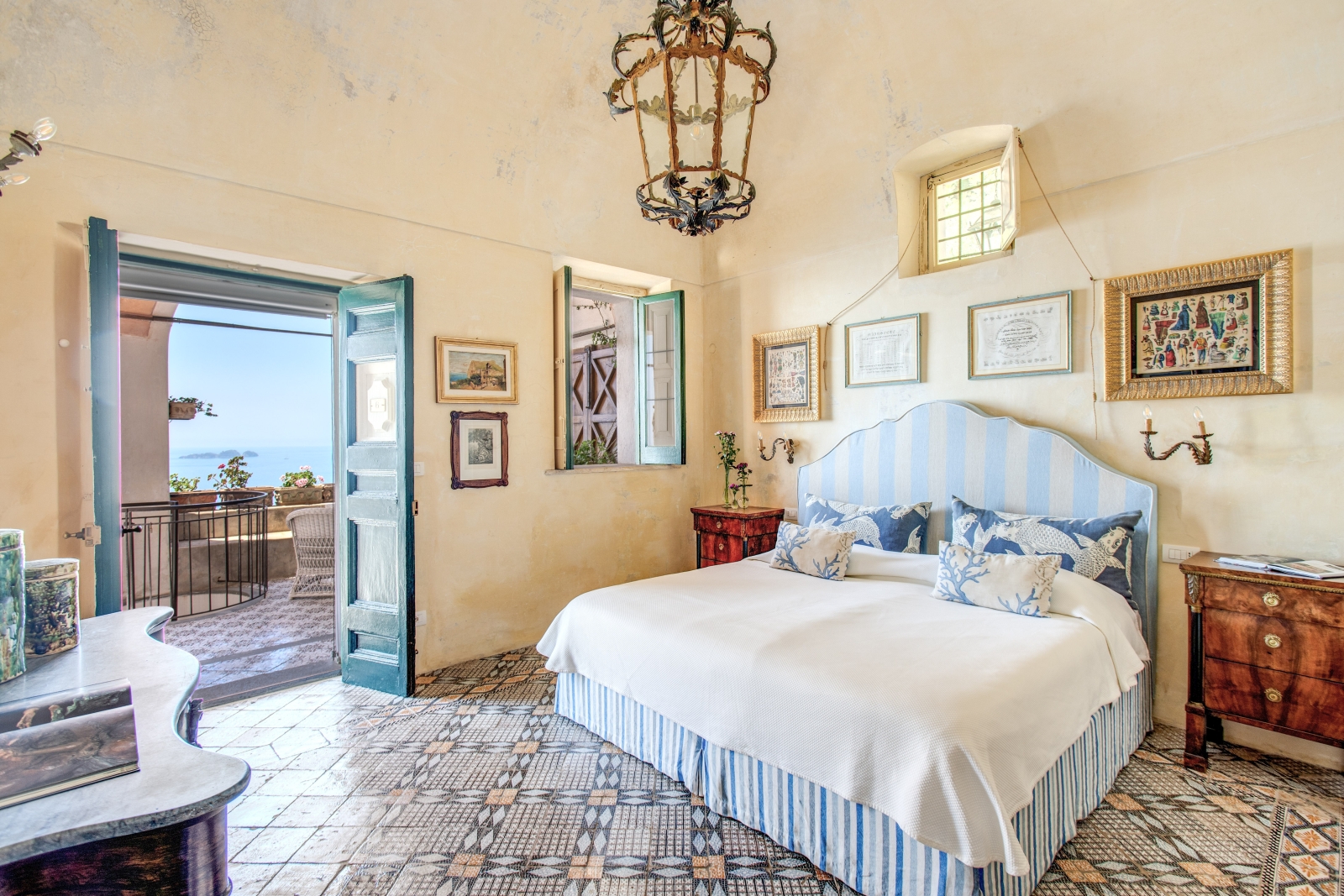 Twin Bedroom with Hollywood headboard and tiled blue floor