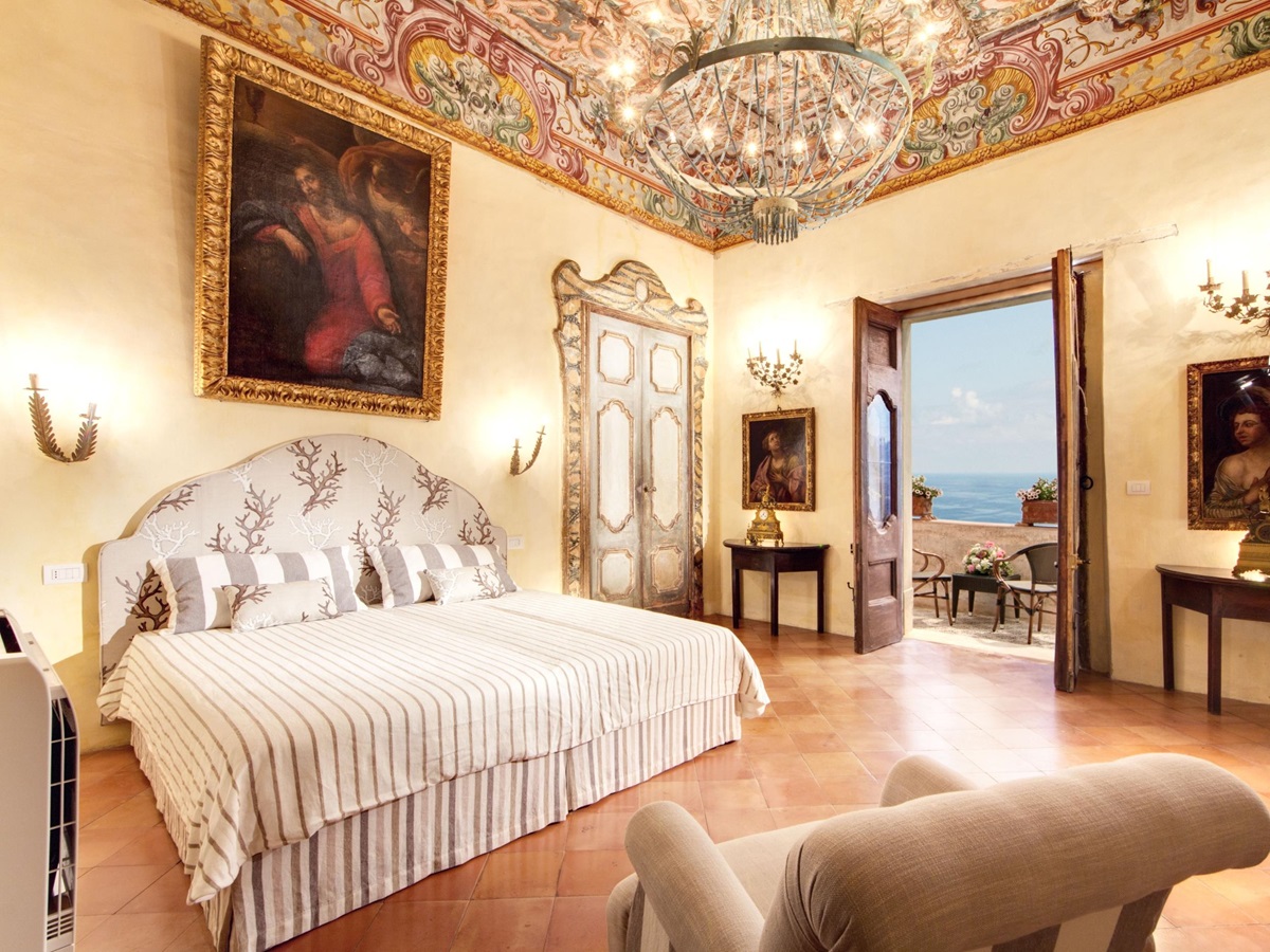 Red stripd double bedroom in Villa Marinella, Amalfi Coast