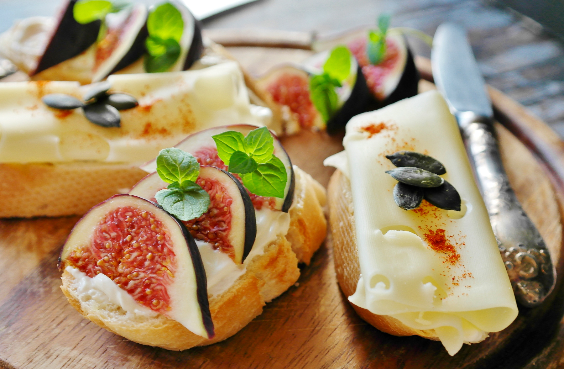 Cheese and figs served on a platter in Italy