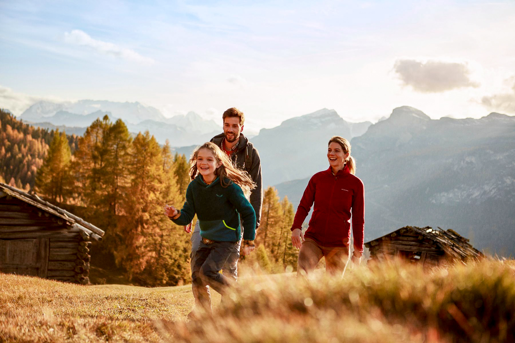 A family walking along a trail in the Dolomites